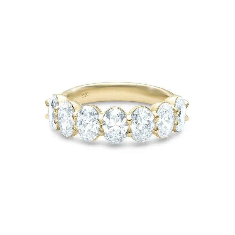 Olivia Seven Stone Anniversary Band in 18k yellow gold with seven oval cut diamonds totaling 1.4ct G VS1, a classic and elegant stone anniversary band.