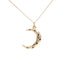 14K gold Crescent Moon Necklace with sapphire starburst accents on an 18-inch chain