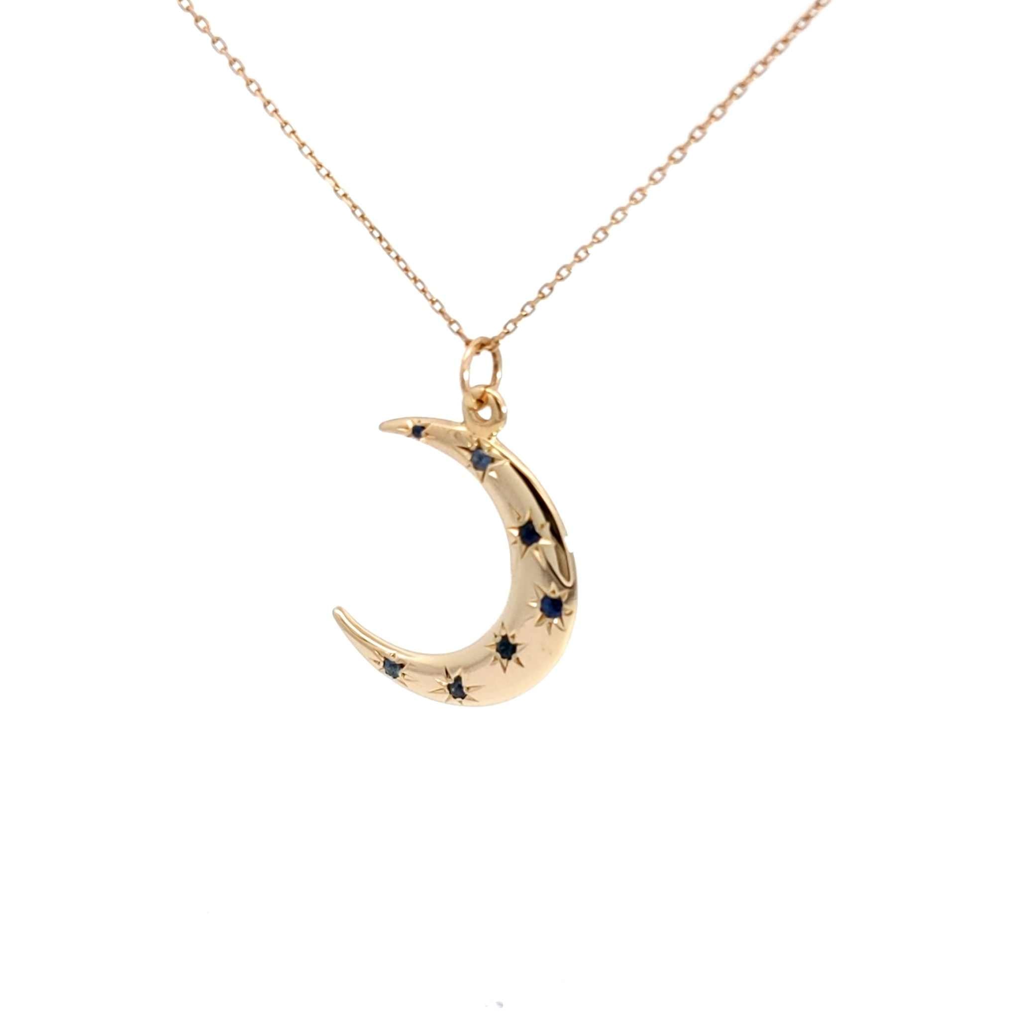 14K gold Crescent Moon Necklace with sapphire starburst design on 18-inch cable chain