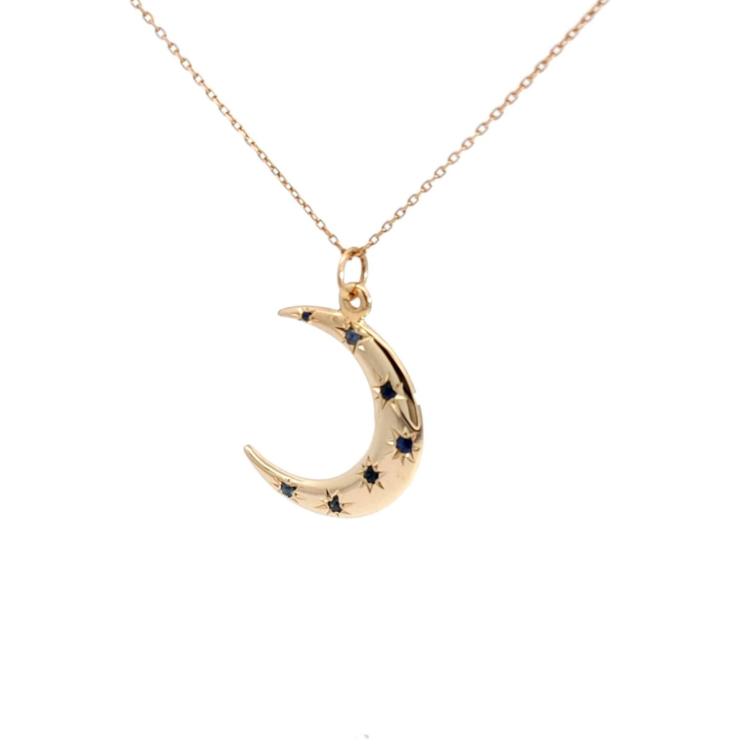 14K gold crescent moon necklace with sapphire starburst design on 18-inch chain