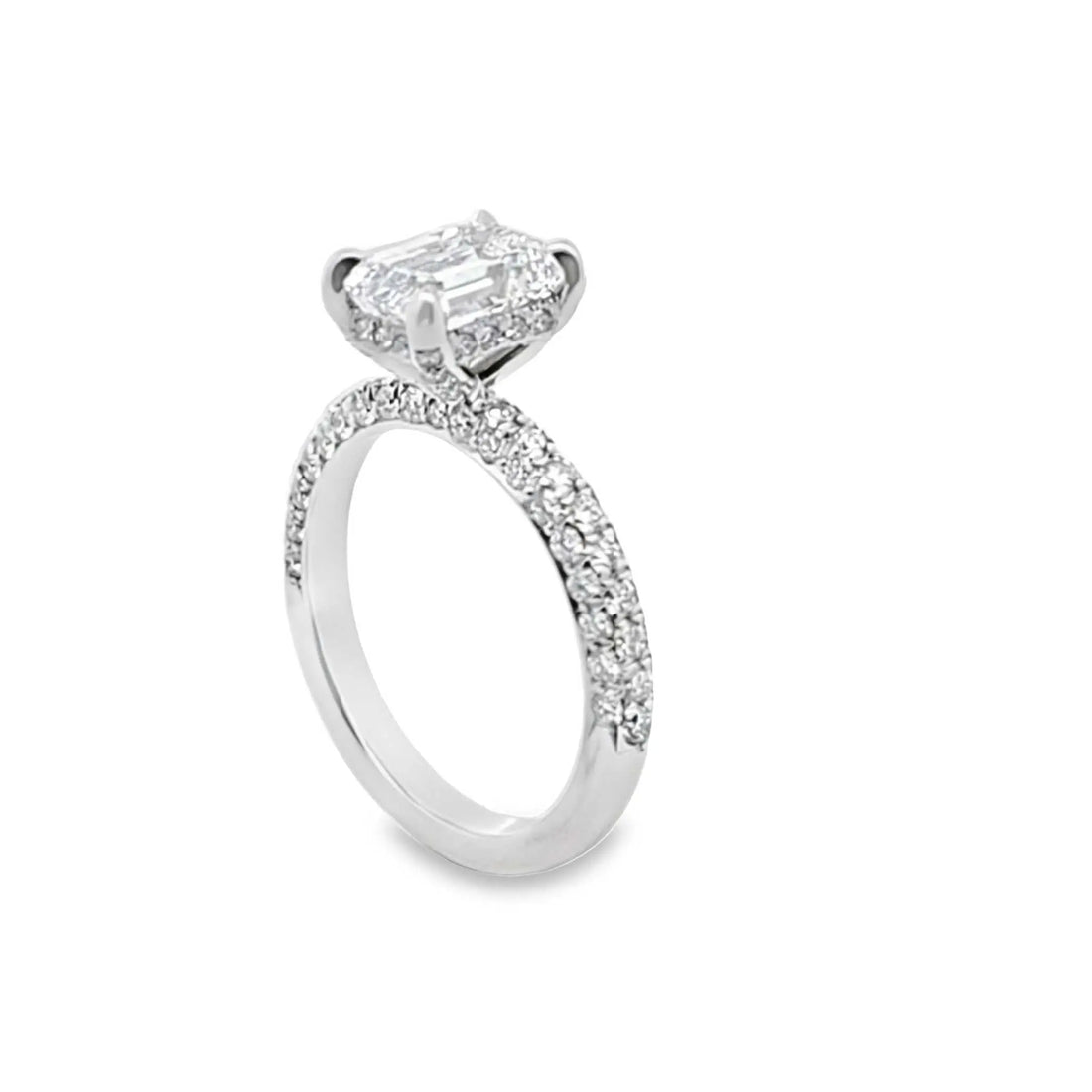 Aria Engagement Ring with 1.5ct emerald-cut diamond and three-row pavé band in platinum