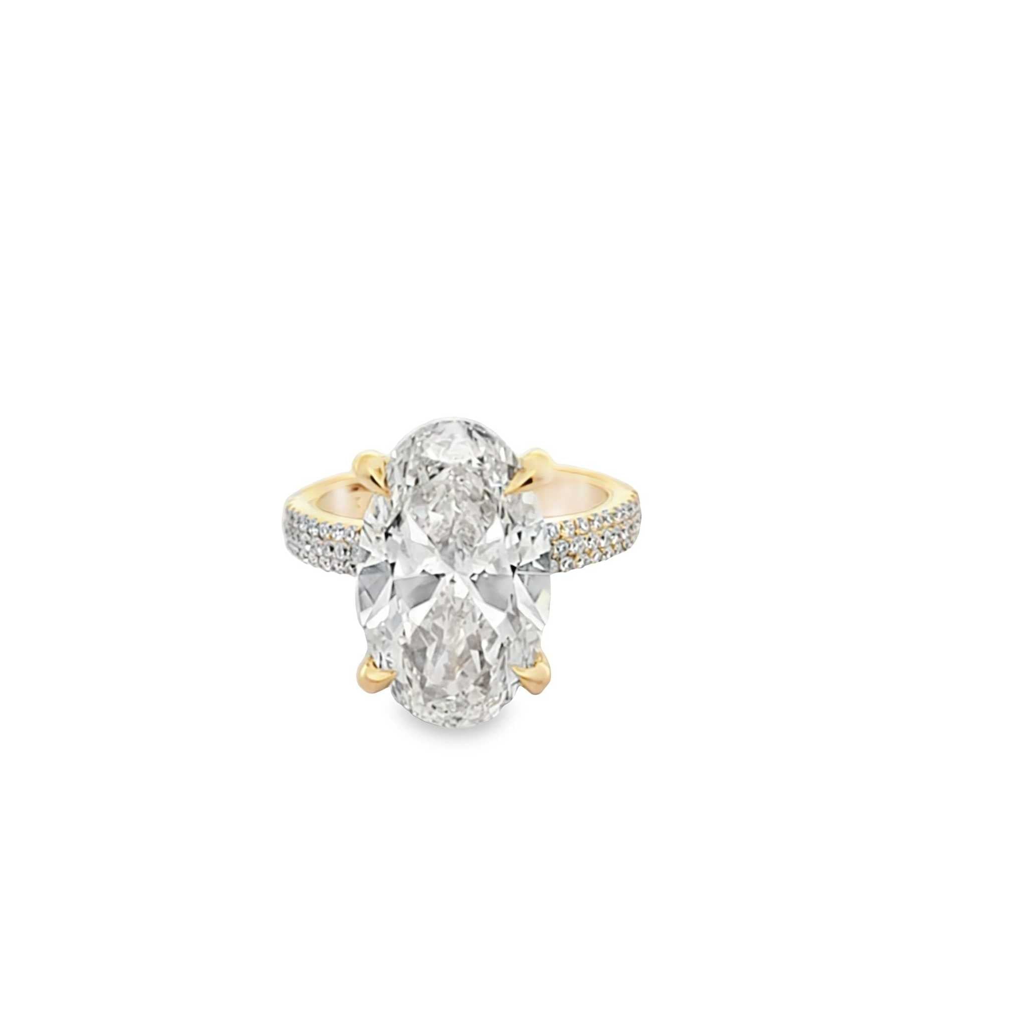 Chelsea Engagement Ring with 6ct oval diamond, hidden halo, diamond prong setting, and three-row pavé band