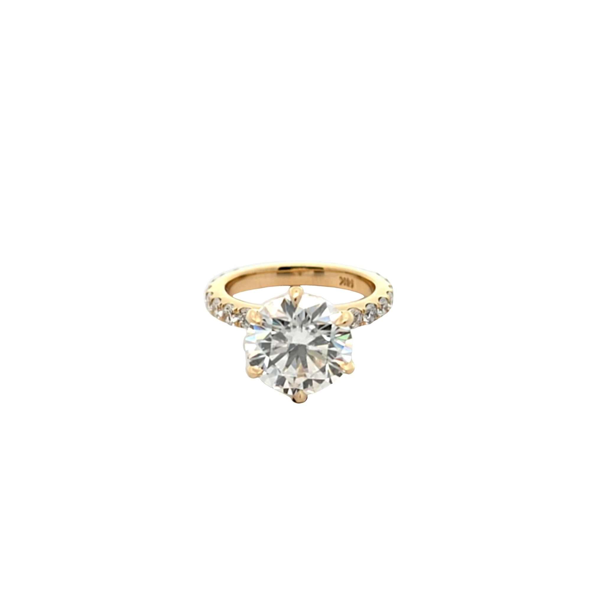 Classic engagement ring with 4.4ct brilliant-cut diamond in 18K yellow gold band adorned with natural diamonds