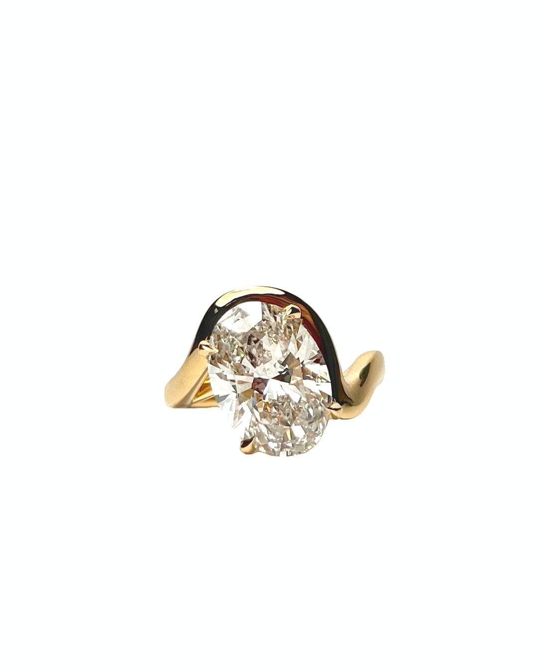 Lucia Engagement Ring with unique angled diamond and wave-like gold shank