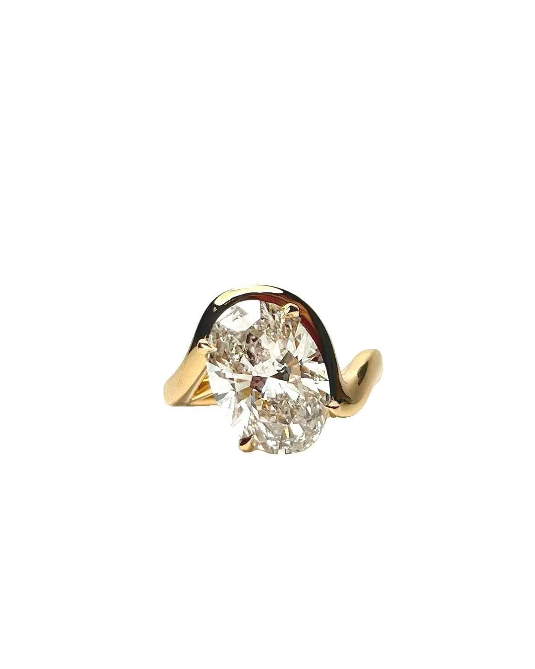 Lucia Engagement Ring with unique angled diamond and hidden halo of natural diamonds