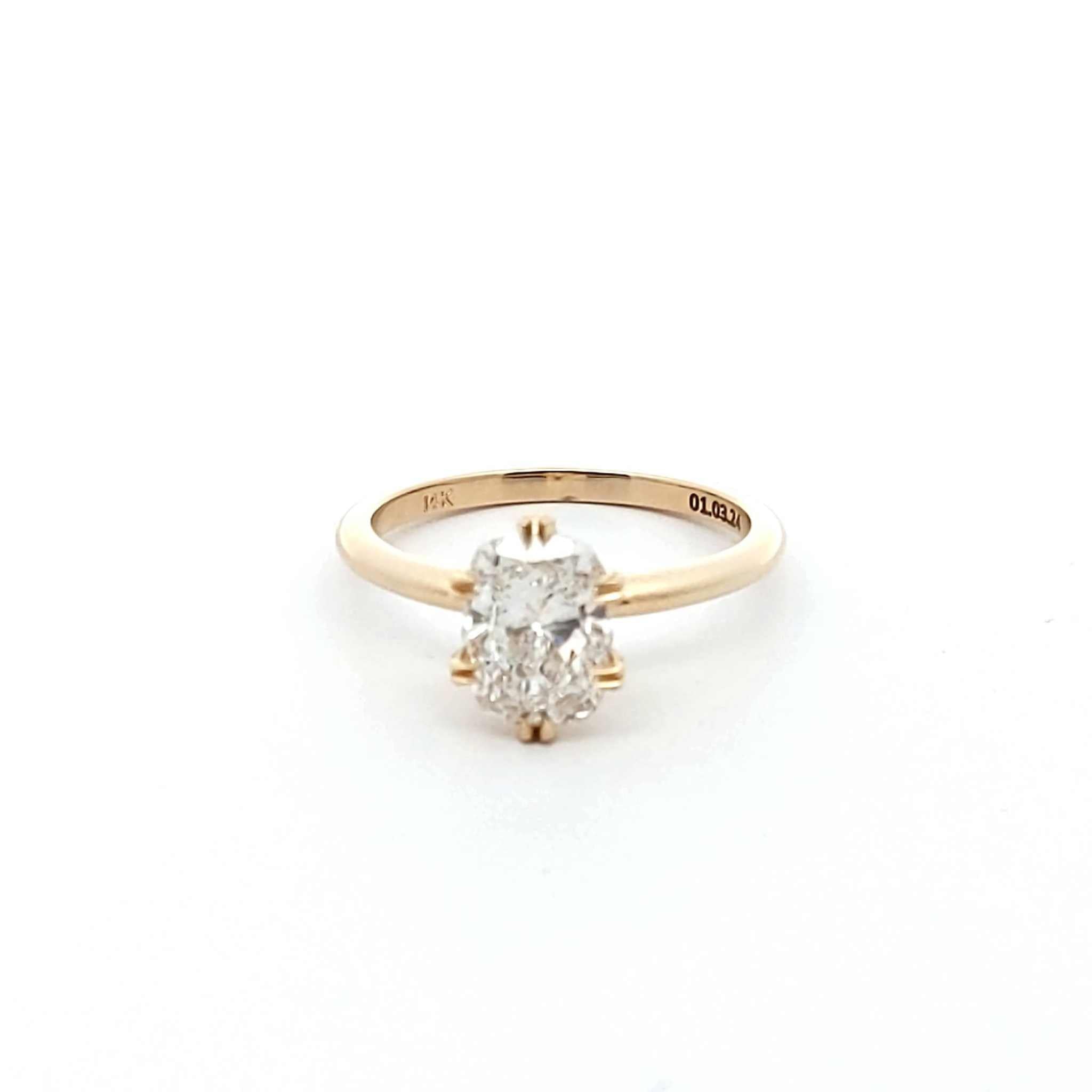 Amaya Solitaire Engagement Ring with cushion-cut diamond and double-prong setting in gold