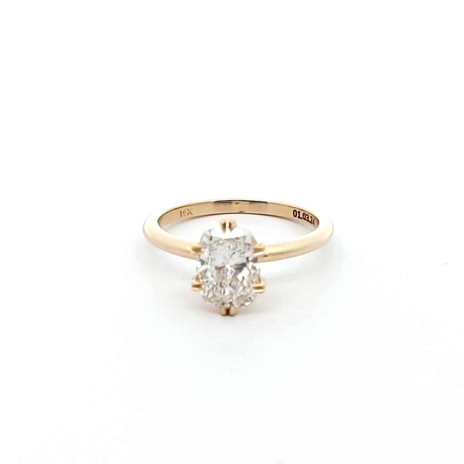 Amaya Solitaire Engagement Ring with cushion-cut diamond and double-prong setting in gold
