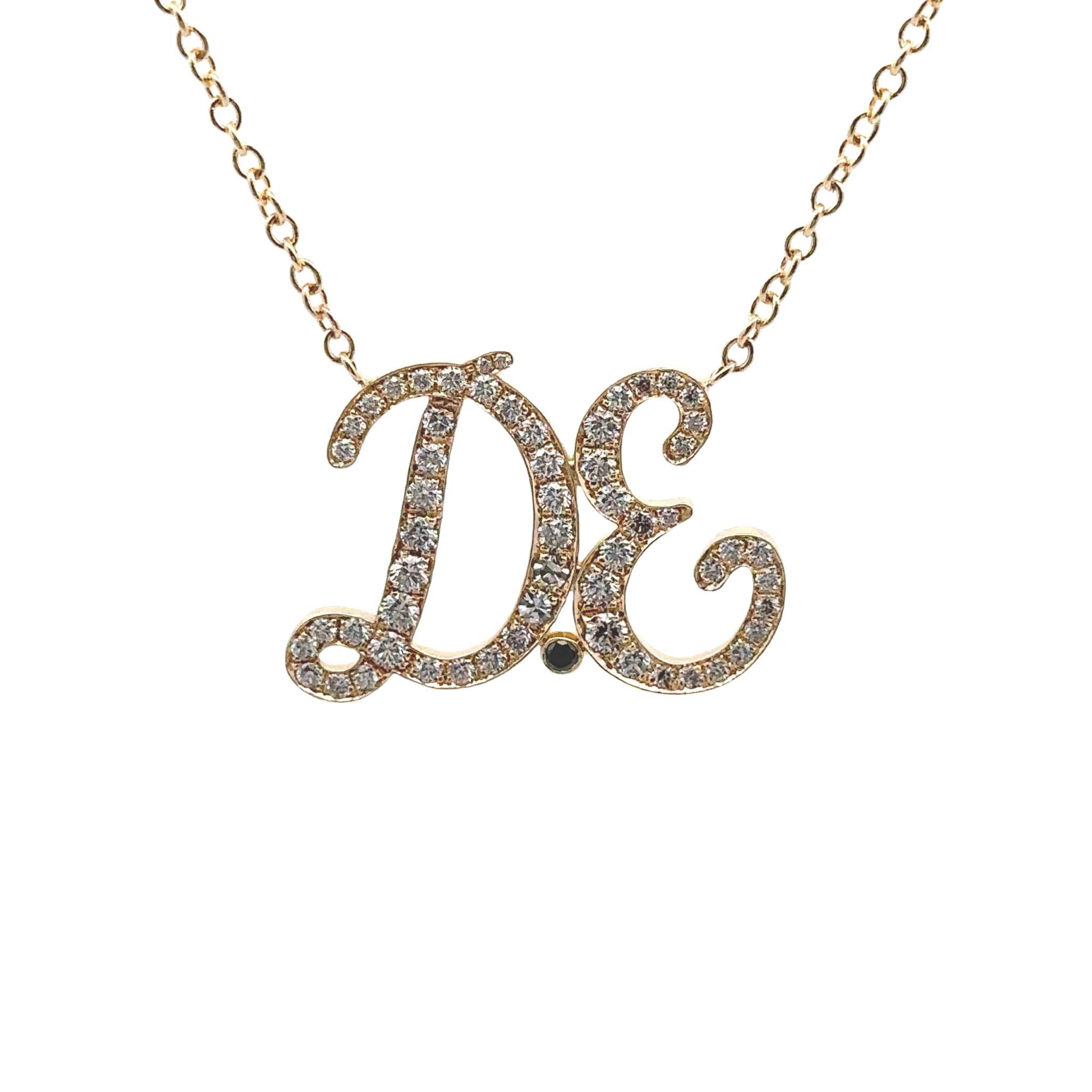 Diamond initial necklace in 18K gold with pavé diamonds on adjustable gold chain