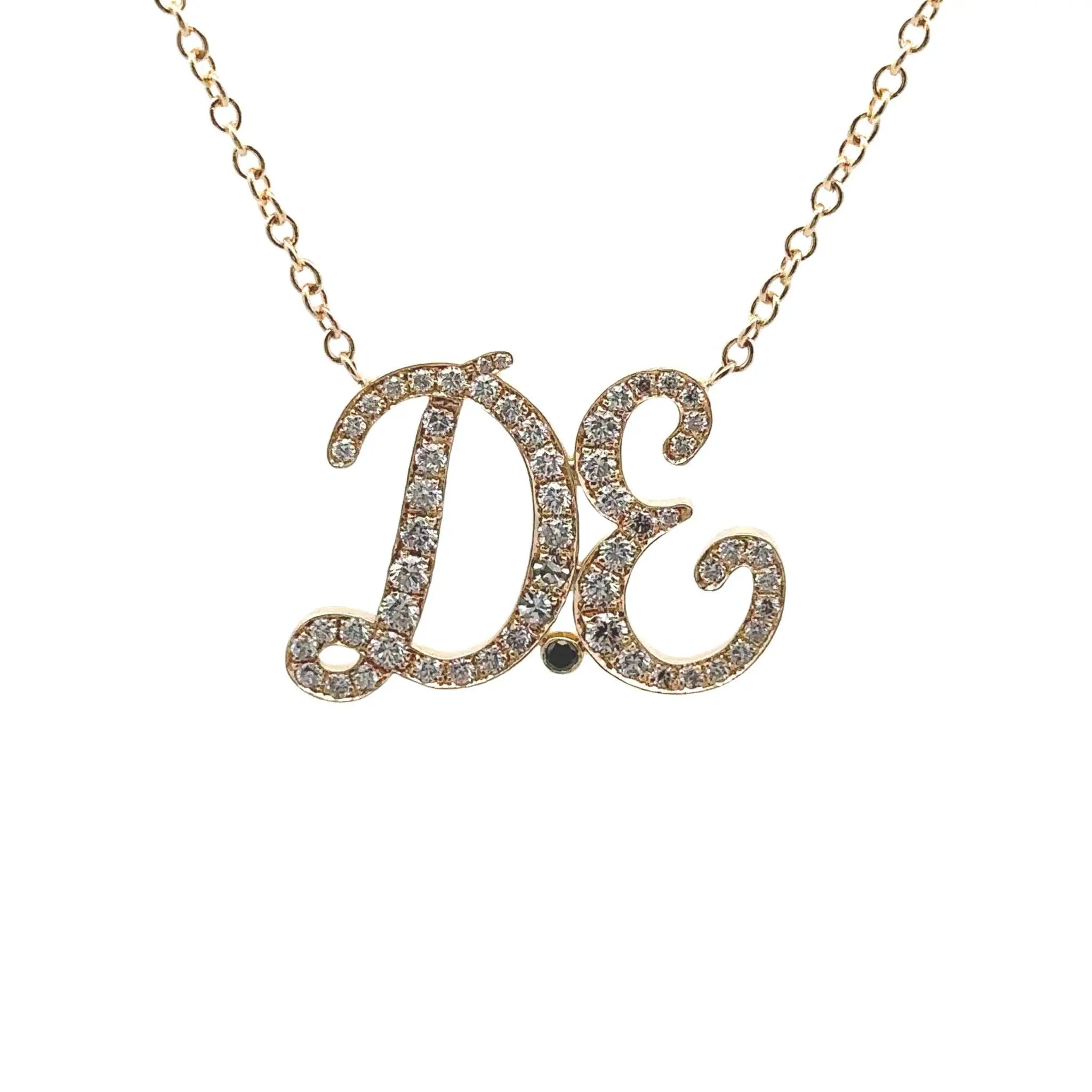 Diamond initial necklace in 18K gold with pavé diamonds on adjustable gold chain