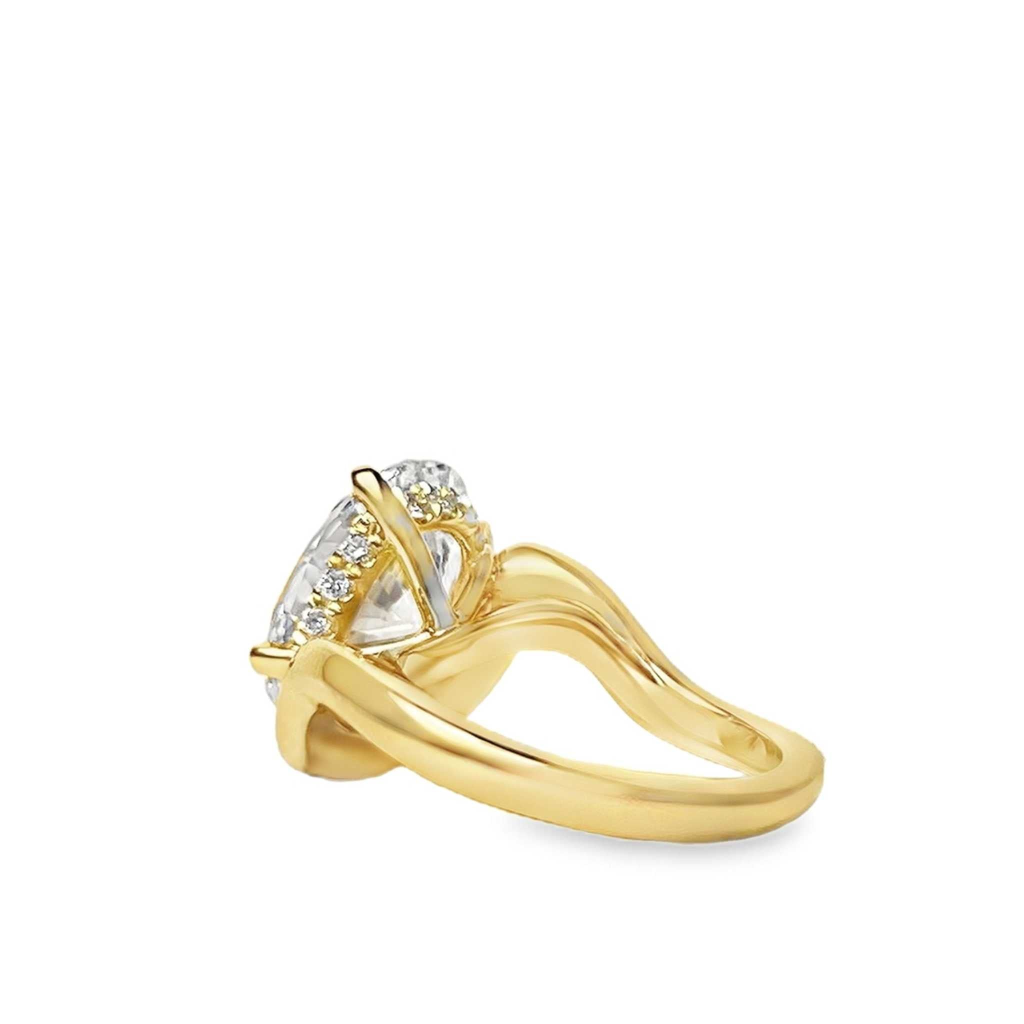 Lucia Engagement Ring gold band with wave-like shank and diamond set at 11-to-5 angle with hidden halo diamonds