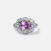 Sami Pink Sapphire and Diamond ring with cushion-cut pink sapphire and surrounding diamonds in rose and white gold