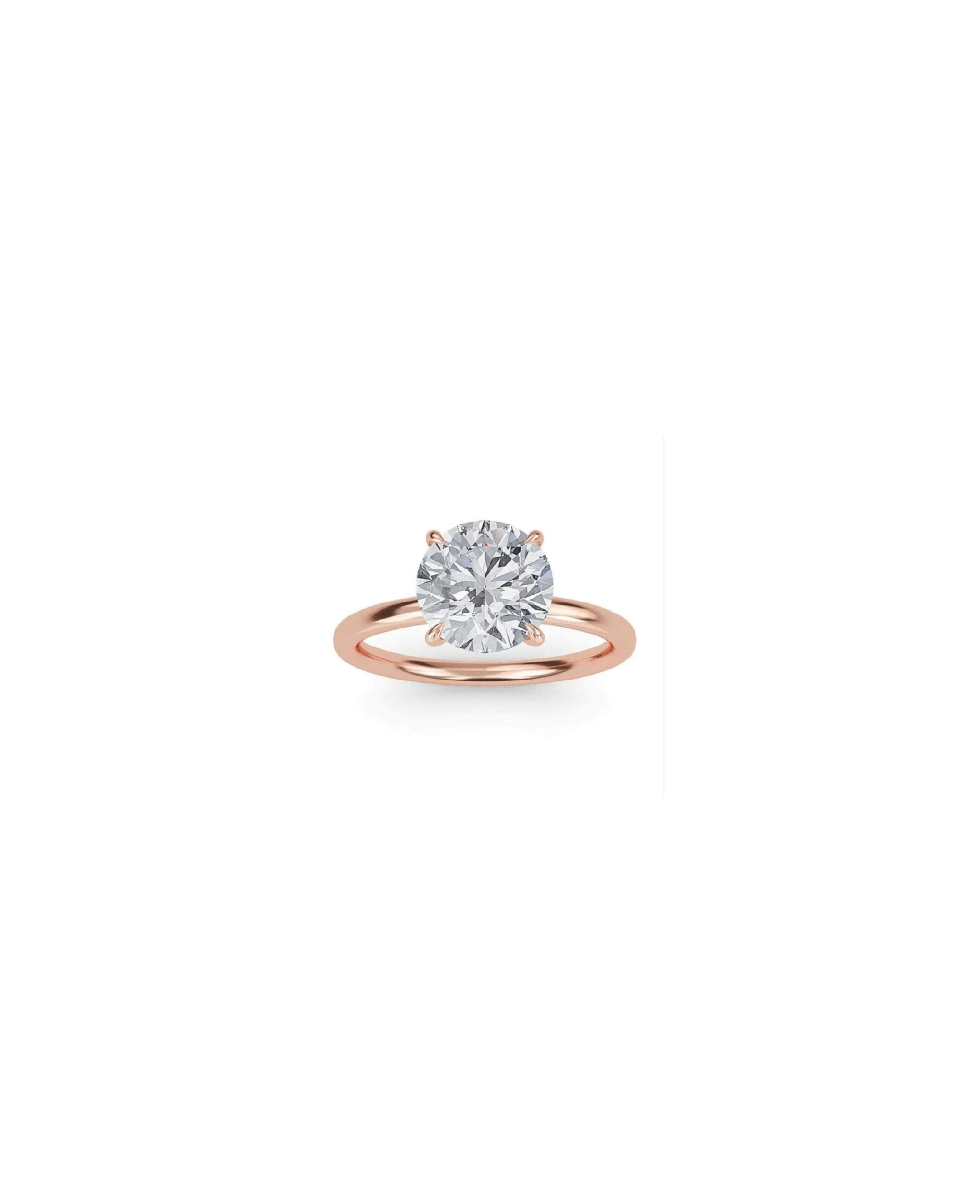 Cleo Solitaire Engagement Ring with 2ct brilliant cut diamond in 18K gold or platinum, showcasing timeless elegance and refined sophistication.