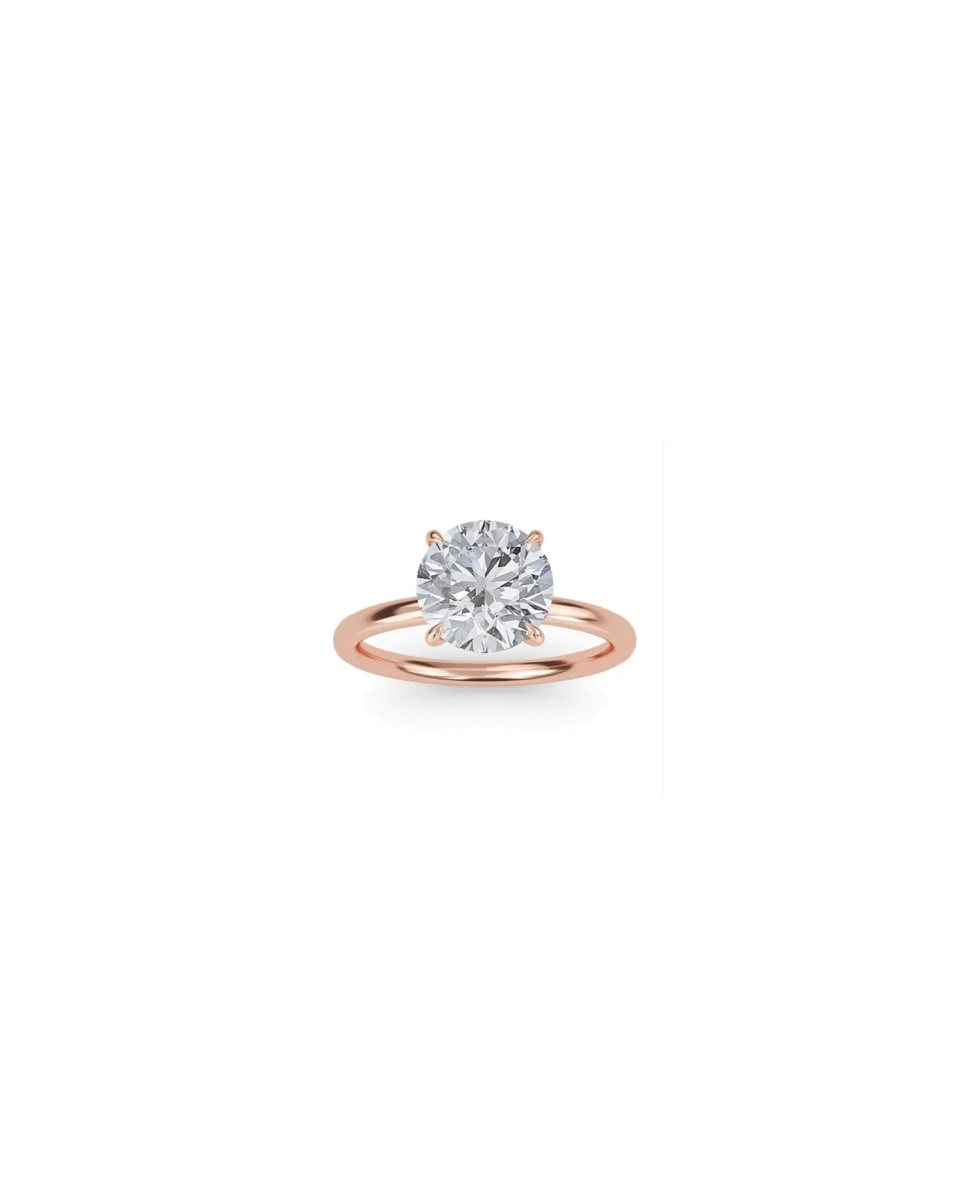 Cleo Solitaire Engagement Ring with 2ct brilliant cut diamond in 18K gold or platinum, showcasing timeless elegance and refined sophistication.