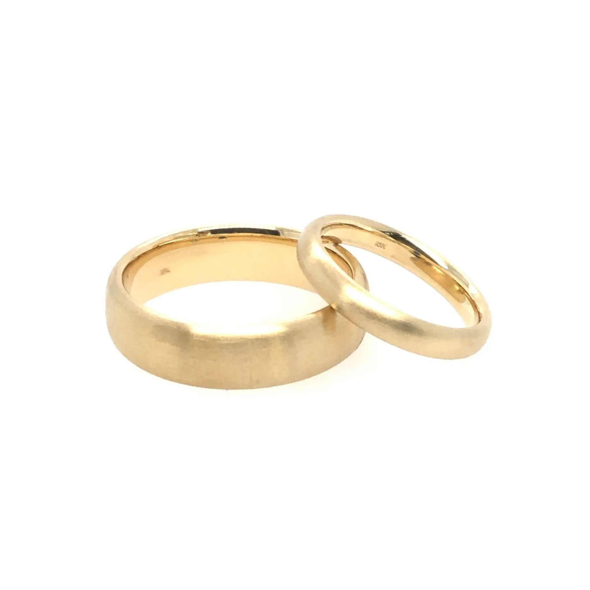 Levi Wedding Band set in 18K gold with satin finish and comfort fit design