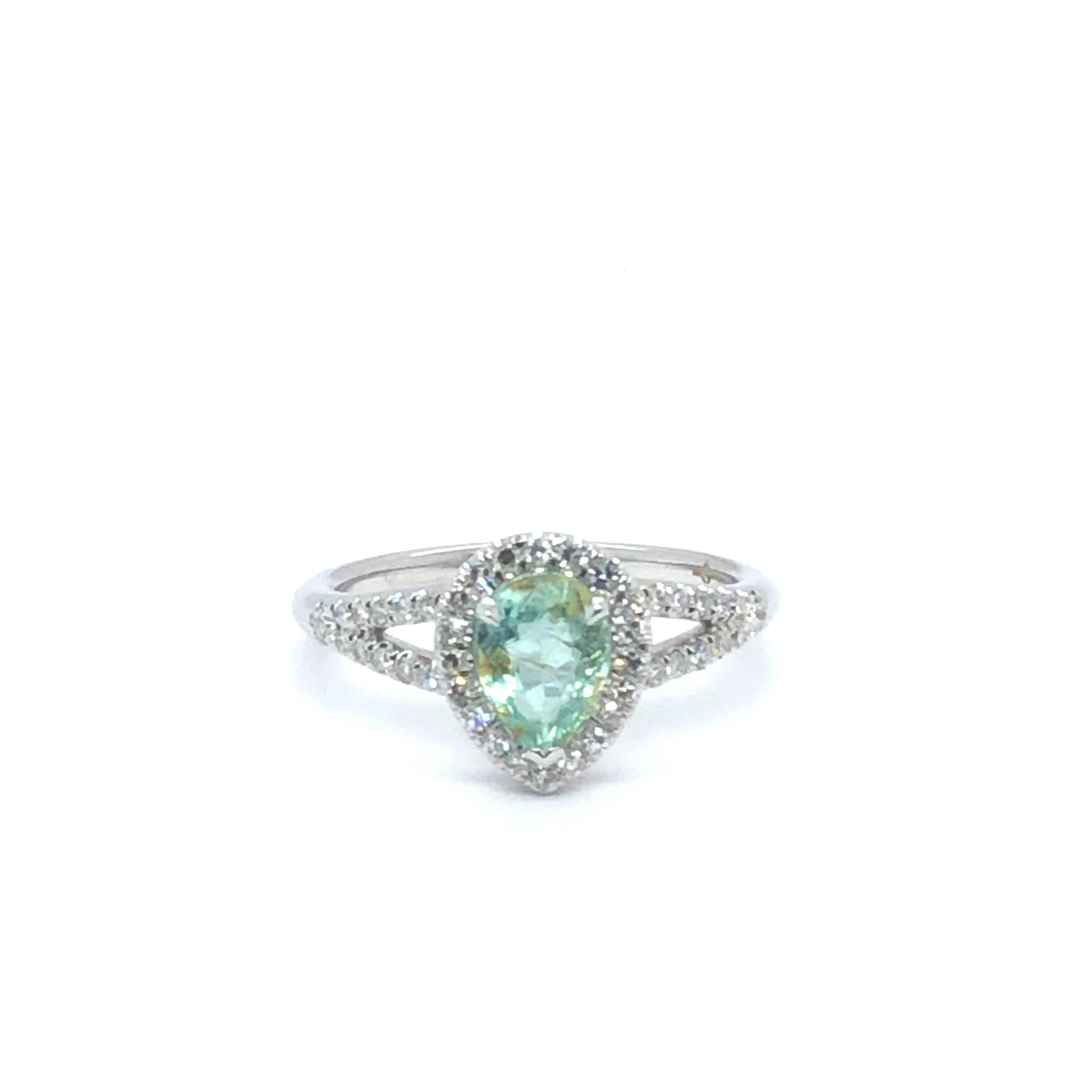 Gigi Alternative Engagement Ring with teal Paraiba Tourmaline center and diamond halo on silver band
