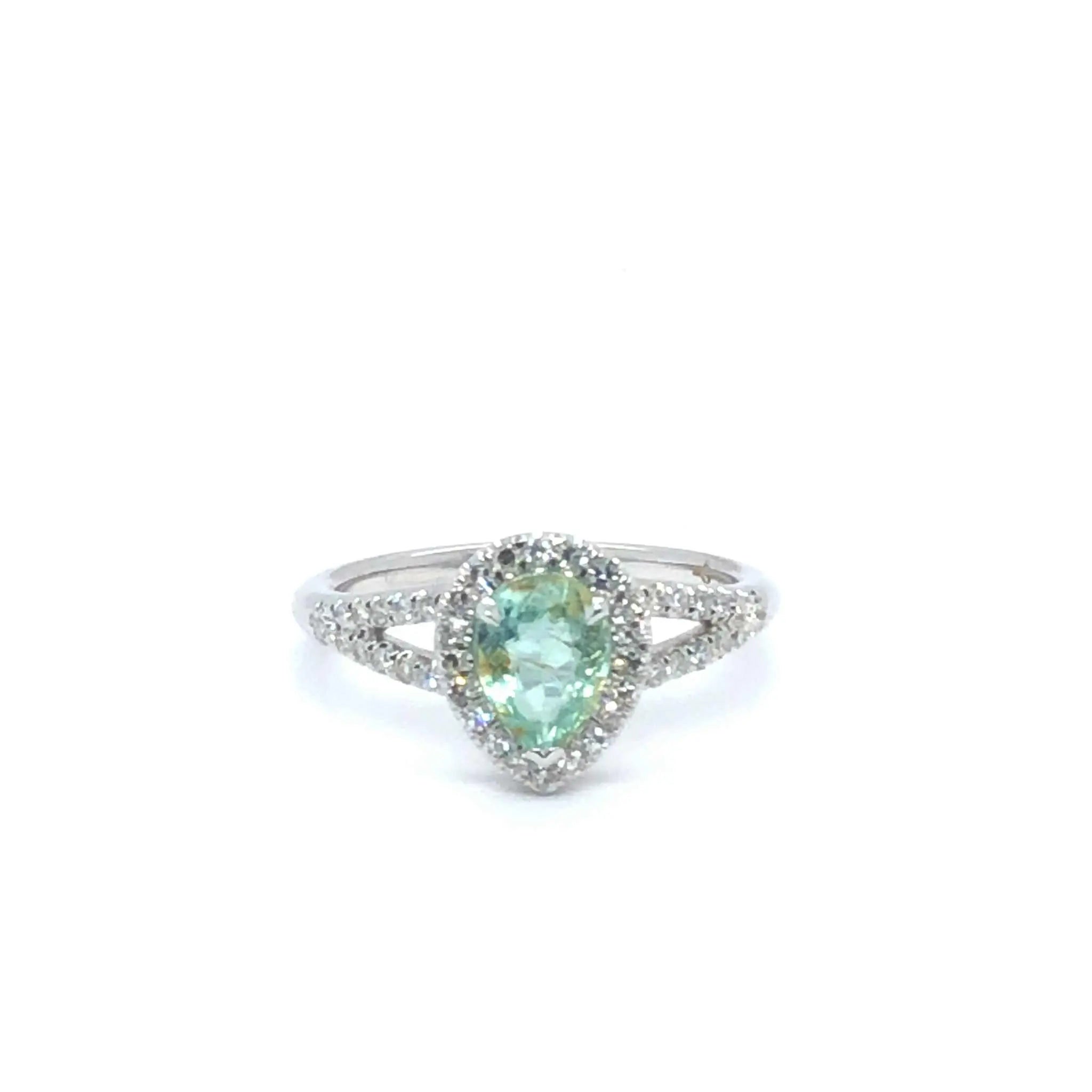 Gigi Alternative Engagement Ring with teal Paraiba Tourmaline and diamond halo on silver band