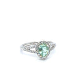 Gigi Alternative Engagement Ring with teal Paraiba tourmaline center and diamond halo on white gold band