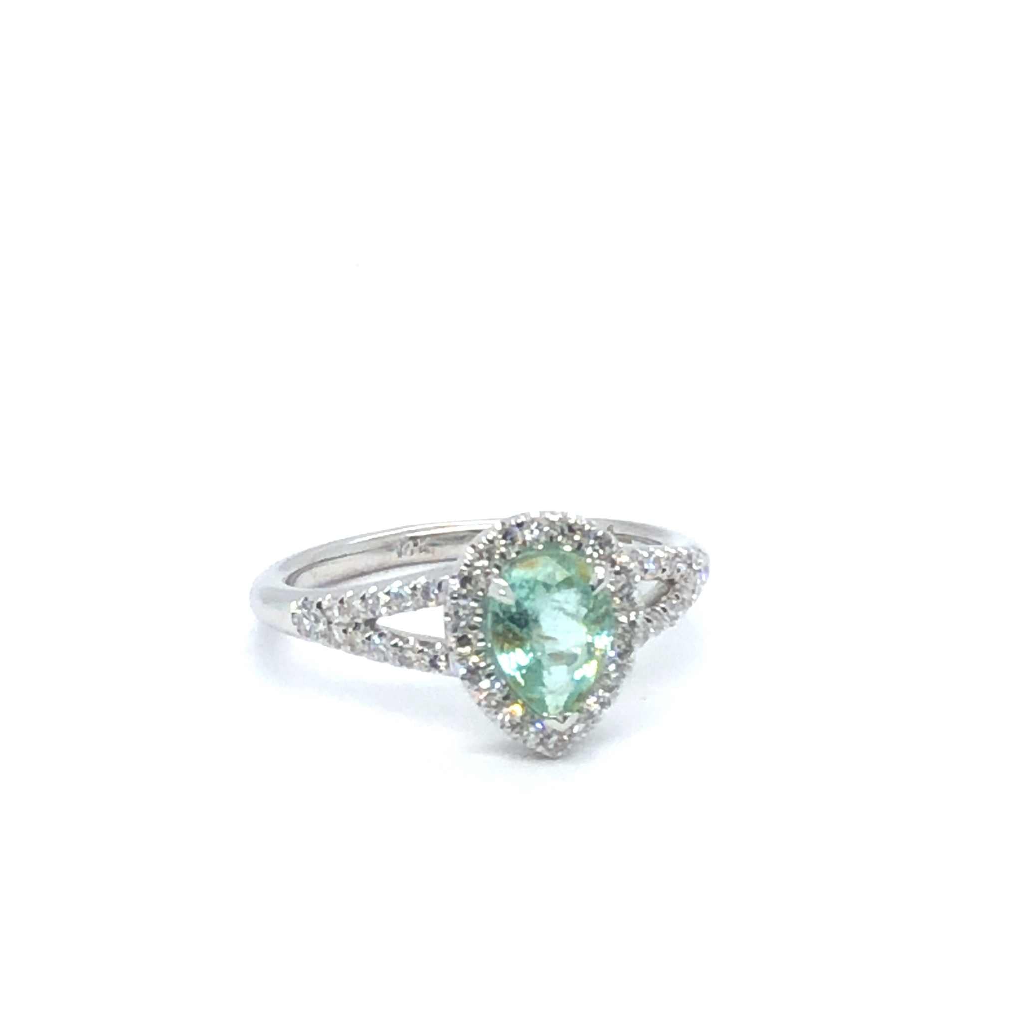 Gigi Alternative Engagement Ring with teal Paraiba tourmaline center and diamond halo on white gold band