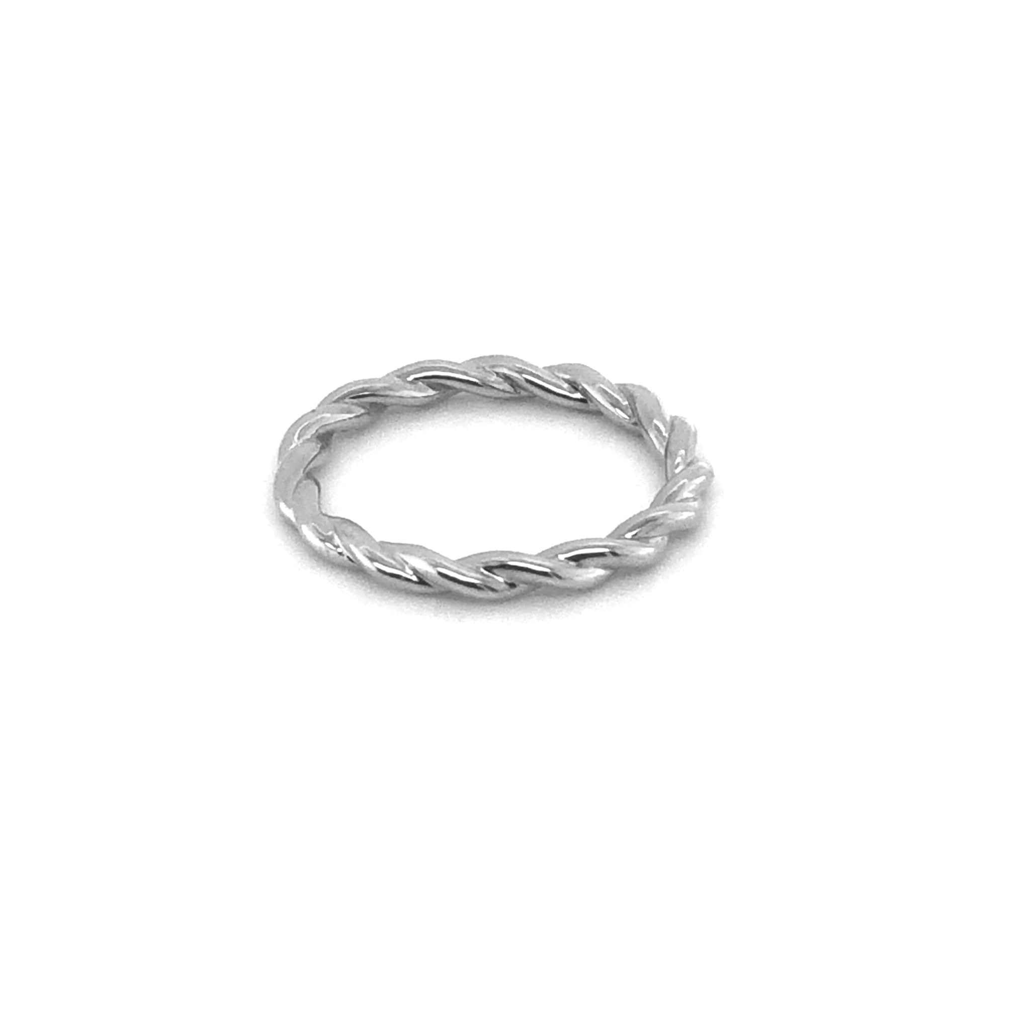 Twisted design Eva Wedding Band in polished silver finish on white background