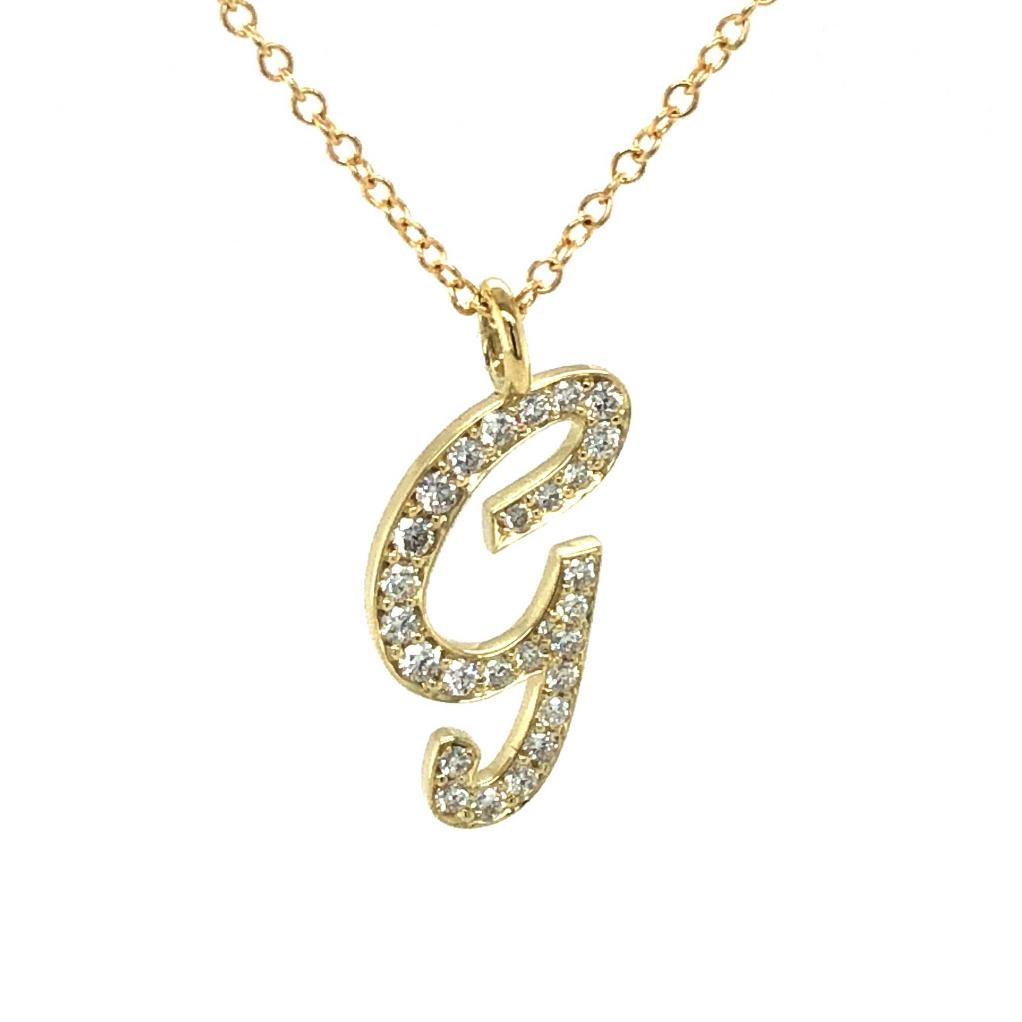 Gold diamond initial necklace pendant letter G with pavé diamonds on gold chain
