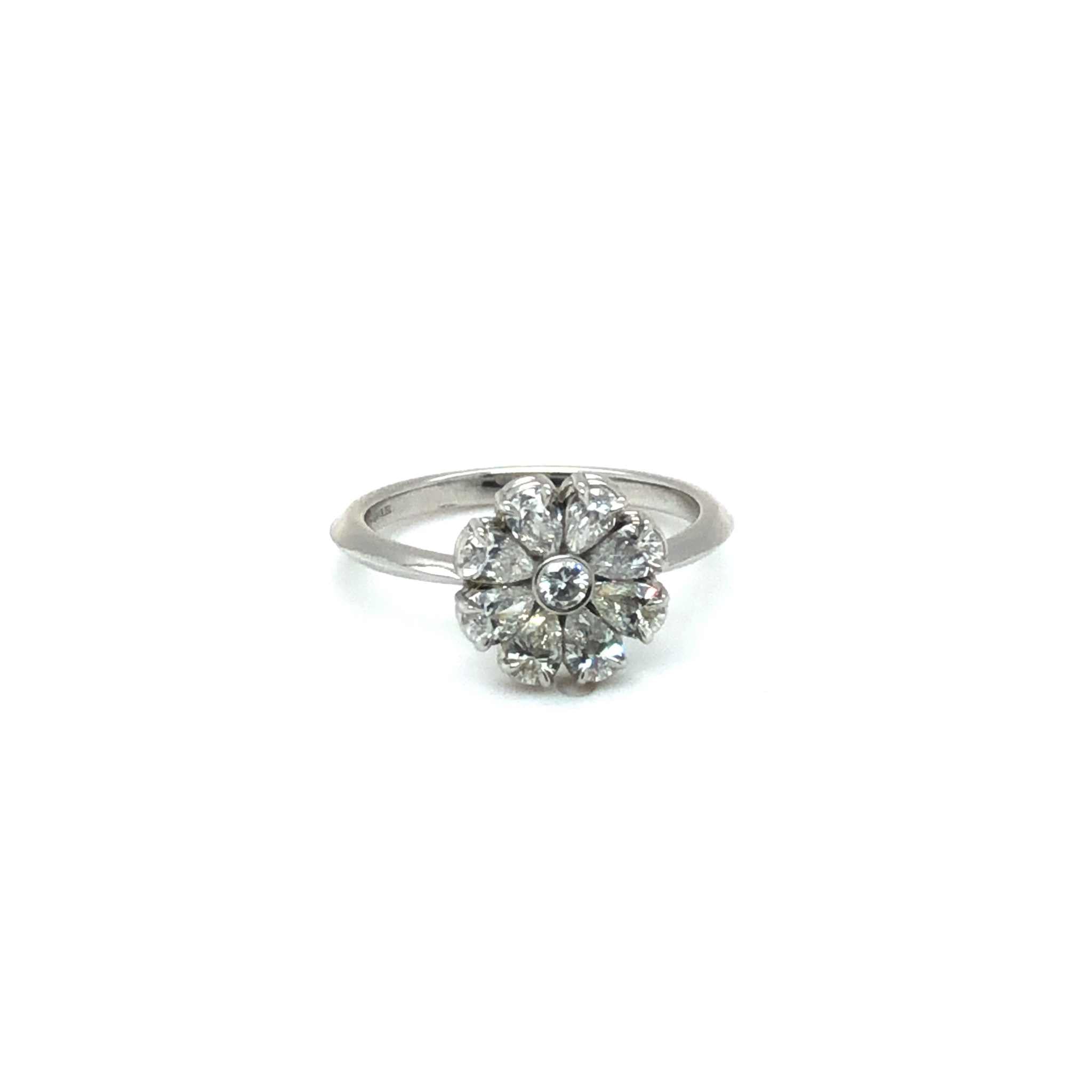 Xena Engagement Ring with eight pear-shaped diamonds in platinum knife-edge setting