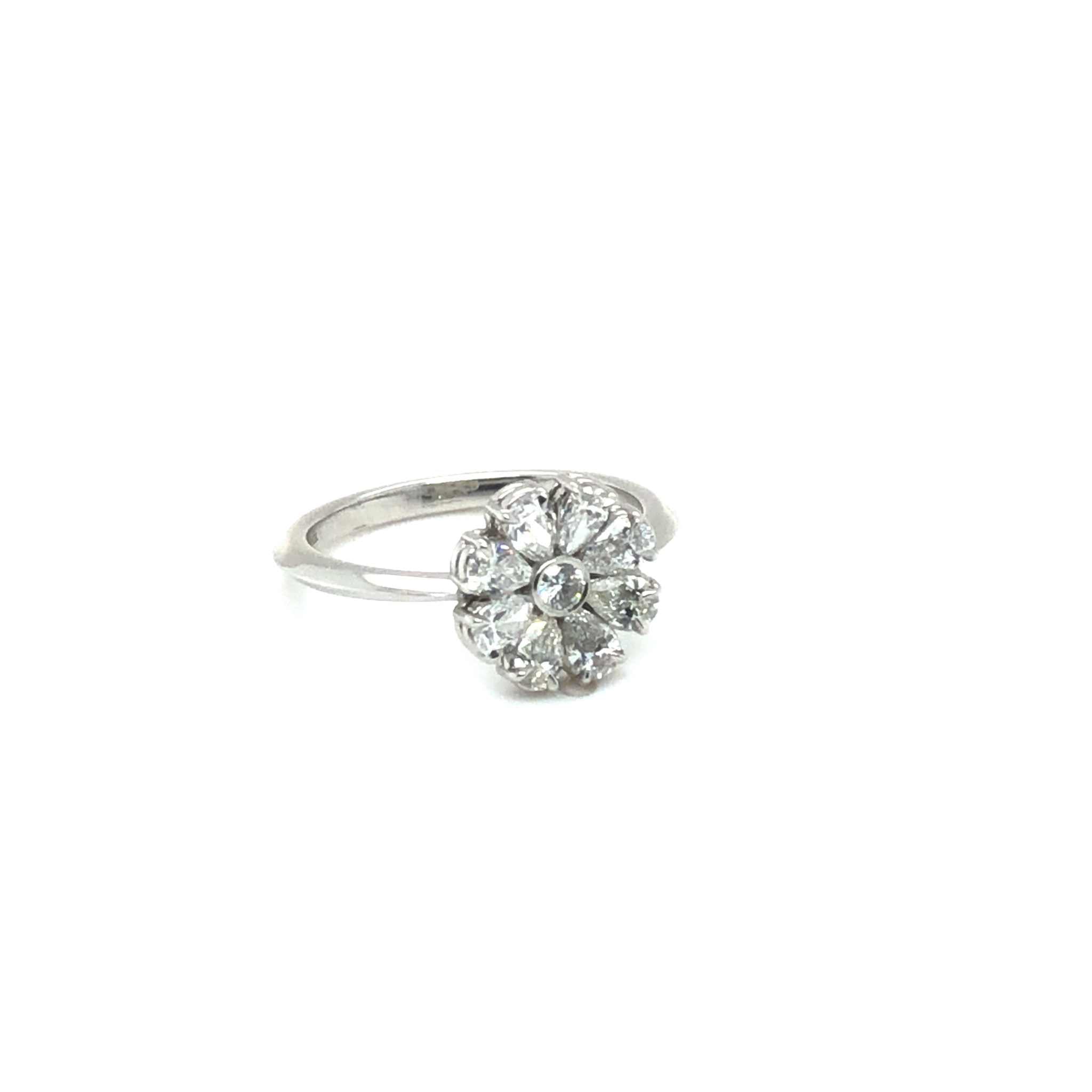 Xena Engagement Ring platinum band with pear-shaped diamonds in flower design