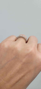 Delilah 5 Stone Anniversary Band platinum ring with five emerald cut diamonds on hand