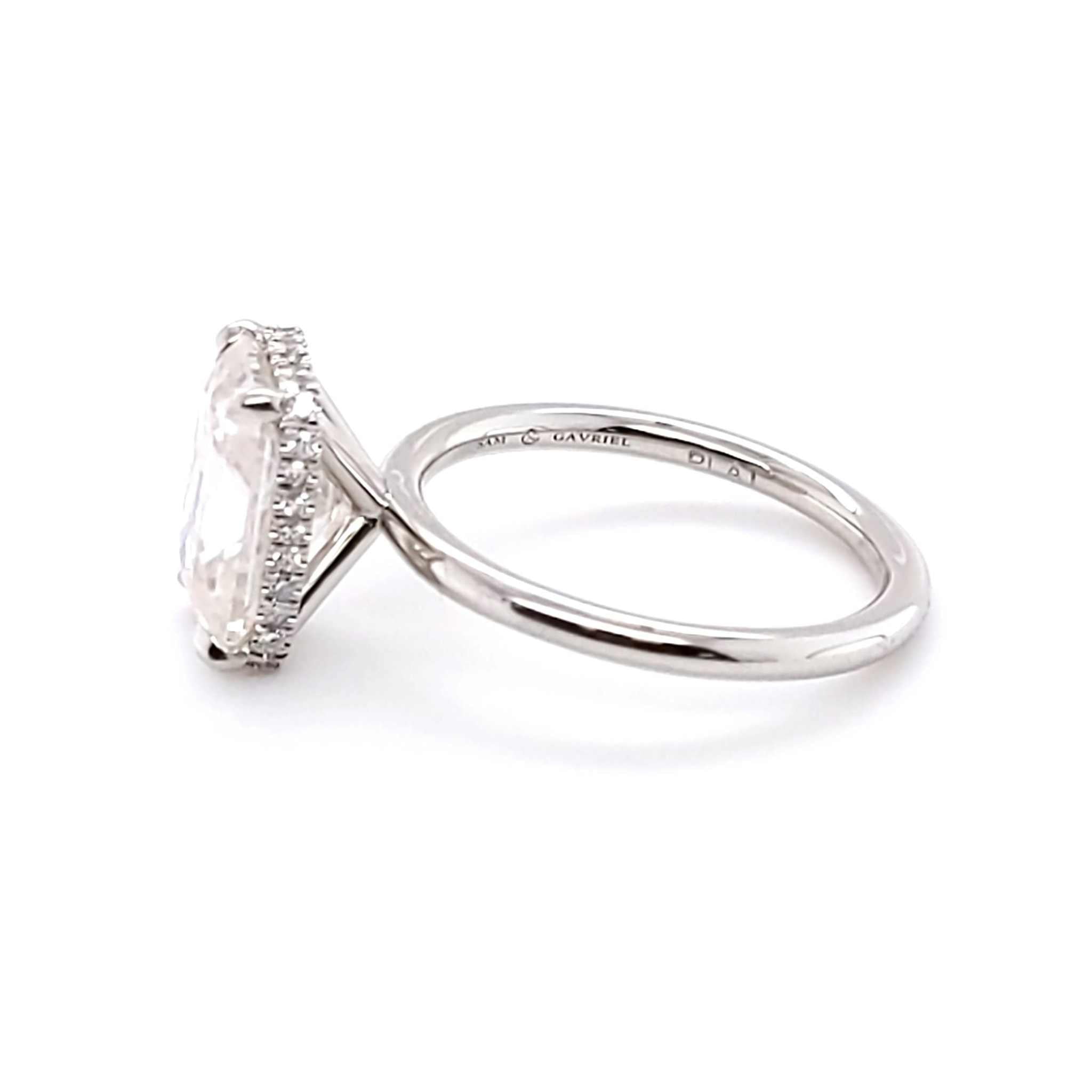 Mimi Hidden Halo Engagement Ring with 4ct radiant cut diamond and hidden halo setting on sleek band