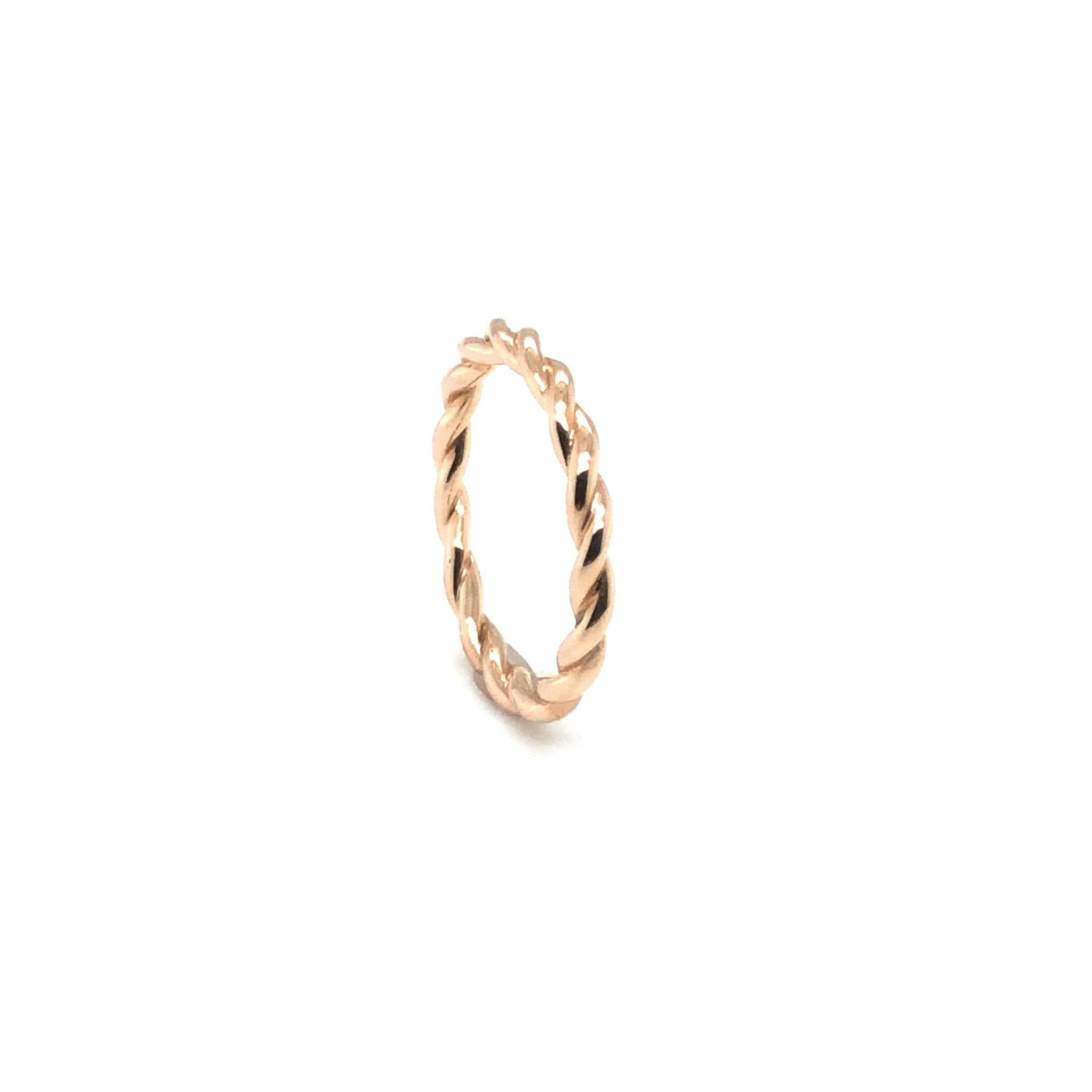 Eva Wedding Band in twisted rose gold design symbolizing elegance and commitment