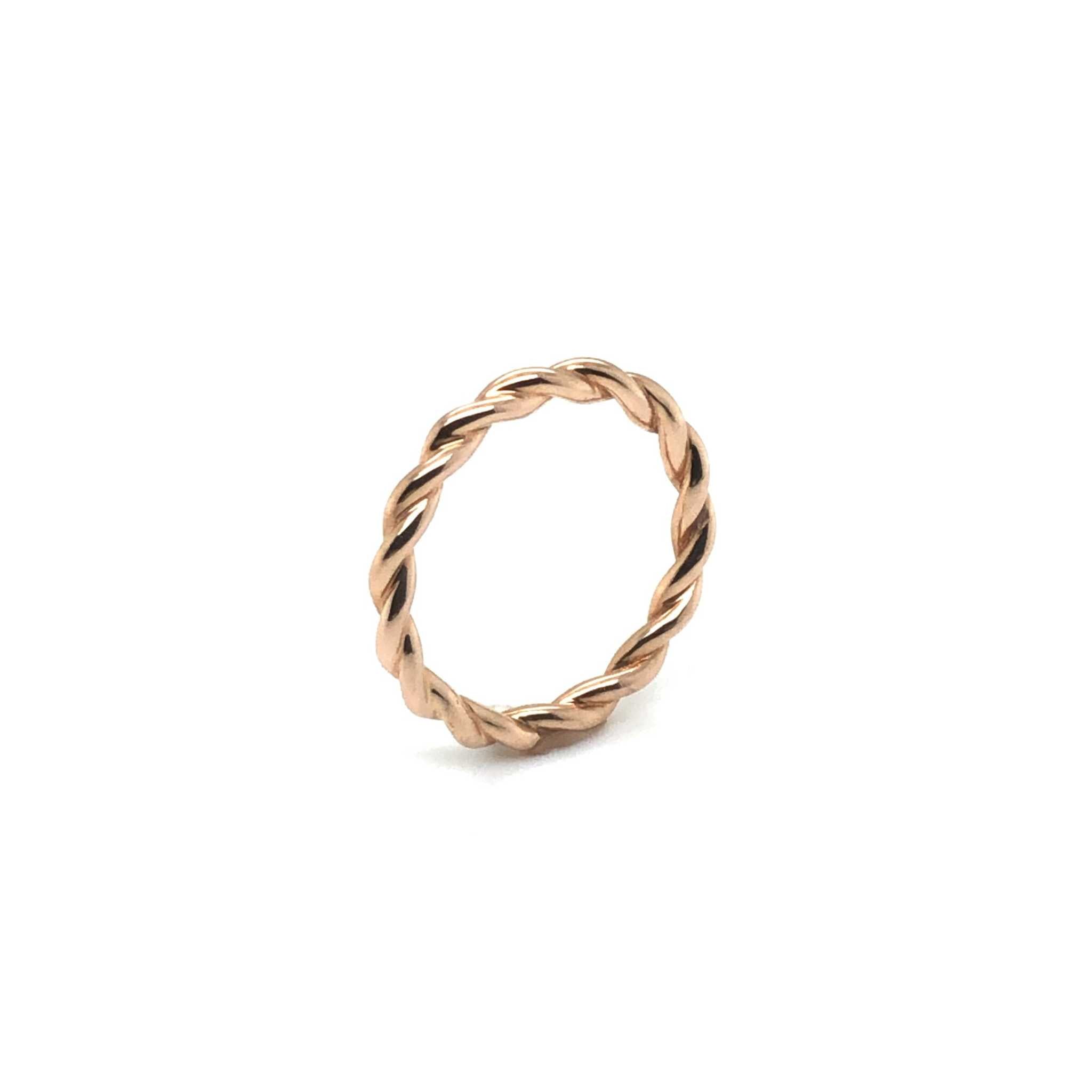 Rose gold twisted Eva Wedding Band symbolizing intertwined lives