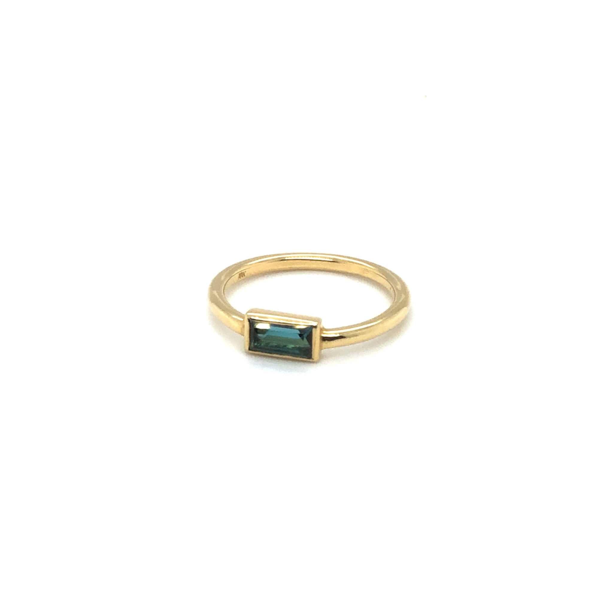 Elegant Tourmaline Solitaire Ring with 0.83ct blue tourmaline in classic gold band setting
