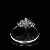 Platinum Daisy Engagement Ring with pear, marquise, and round diamonds totaling 0.95 carats in a knife-edge setting