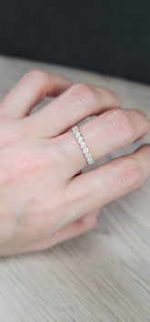 Mona Diamond Wedding Band in 18K yellow gold with sparkling natural diamonds on hand