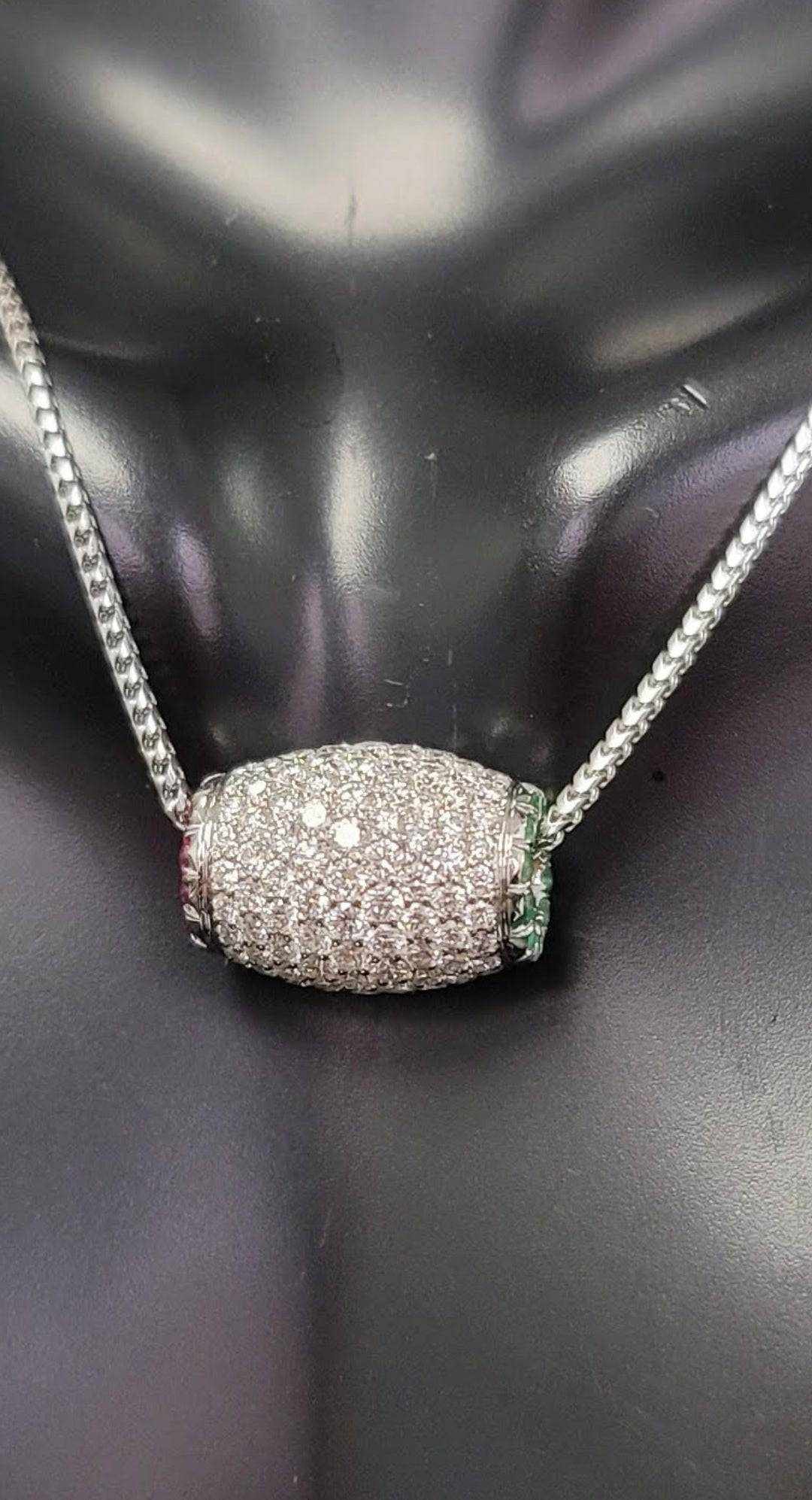 Ariella Necklace in 18K white gold with 2.2 carats VS diamonds, emerald, and ruby gemstones on a silver chain