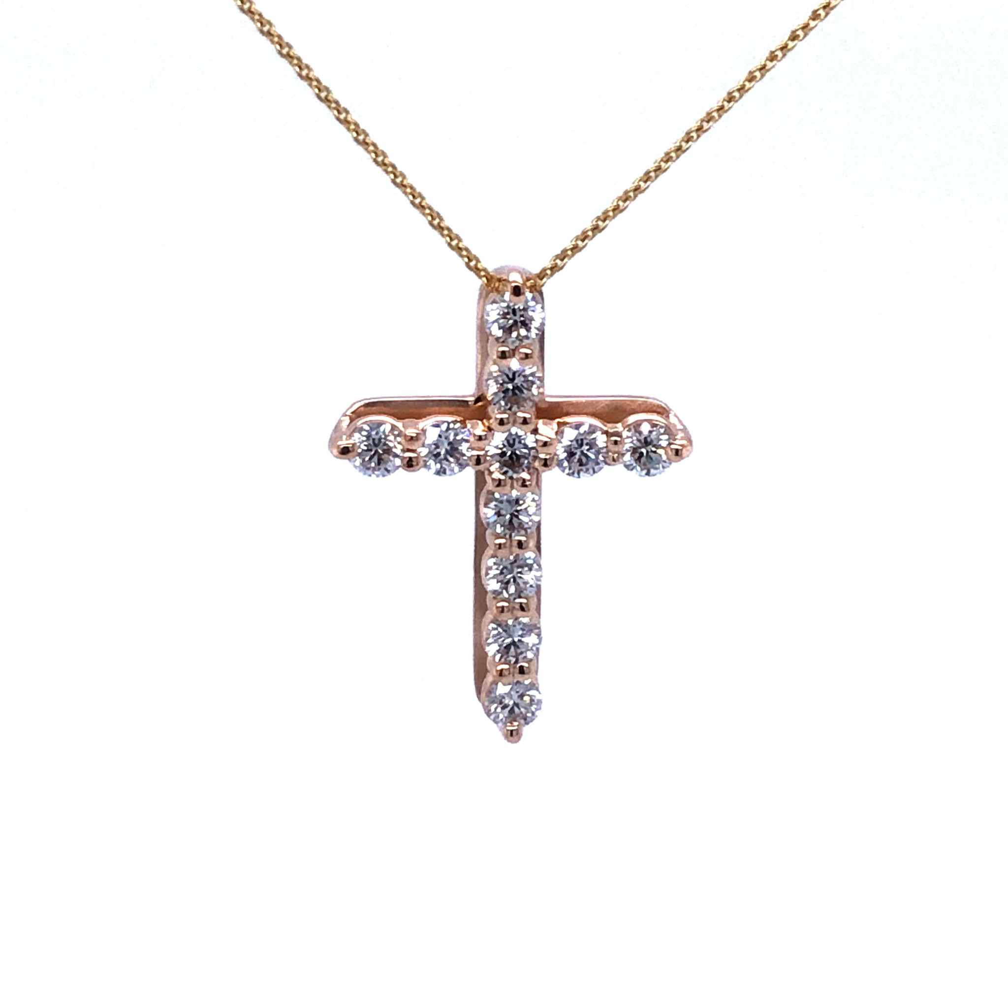 18k gold diamond cross pendant necklace with sparkling F VS1 diamonds on delicate chain
