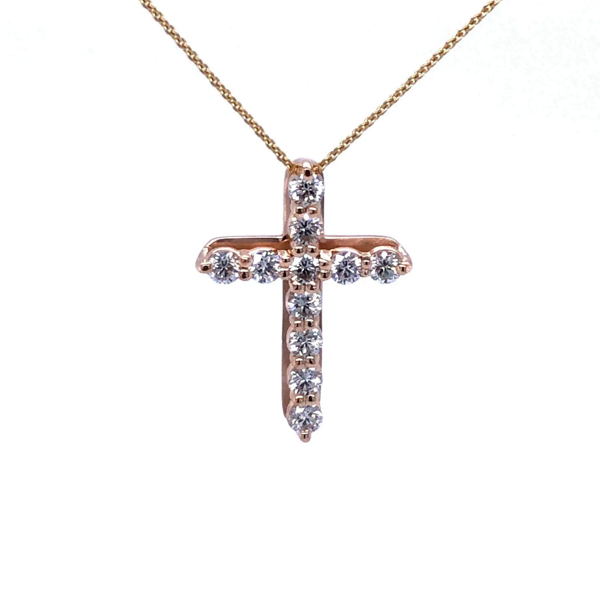 18k gold diamond cross pendant necklace with sparkling F VS1 diamonds on delicate chain