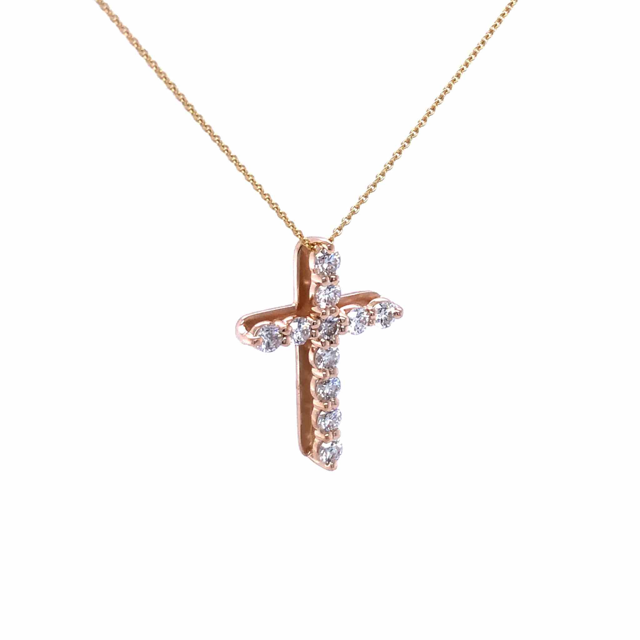 18k gold diamond cross pendant with sparkling F VS1 diamonds on a delicate chain