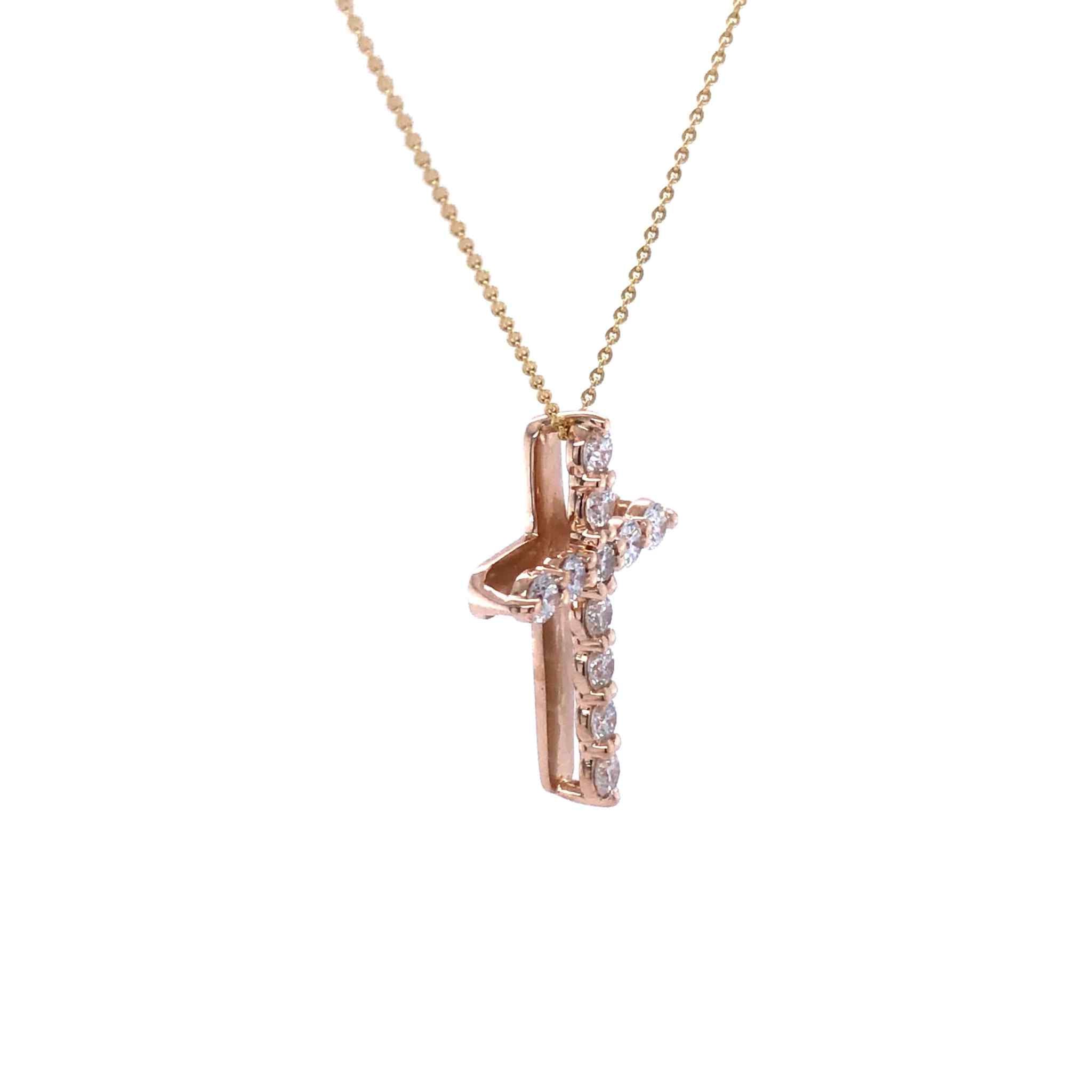 18k gold diamond cross pendant with F VS1 diamonds on a delicate chain