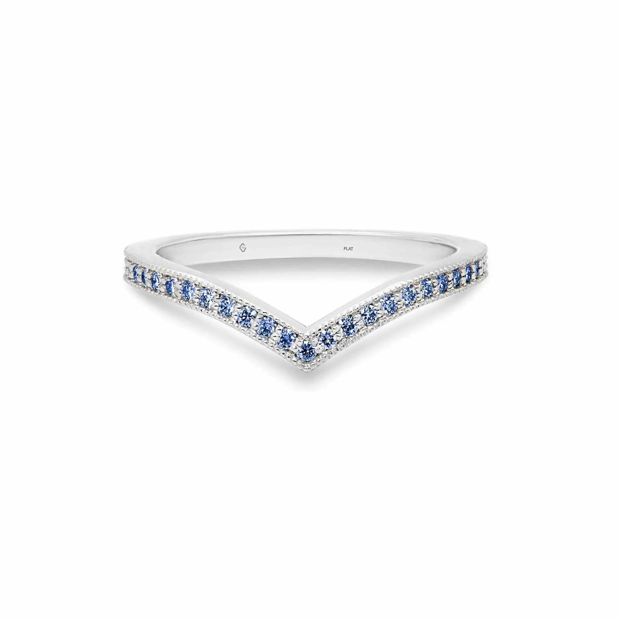 Ava Wedding Band in platinum with round fancy blue diamonds and milgrain edge