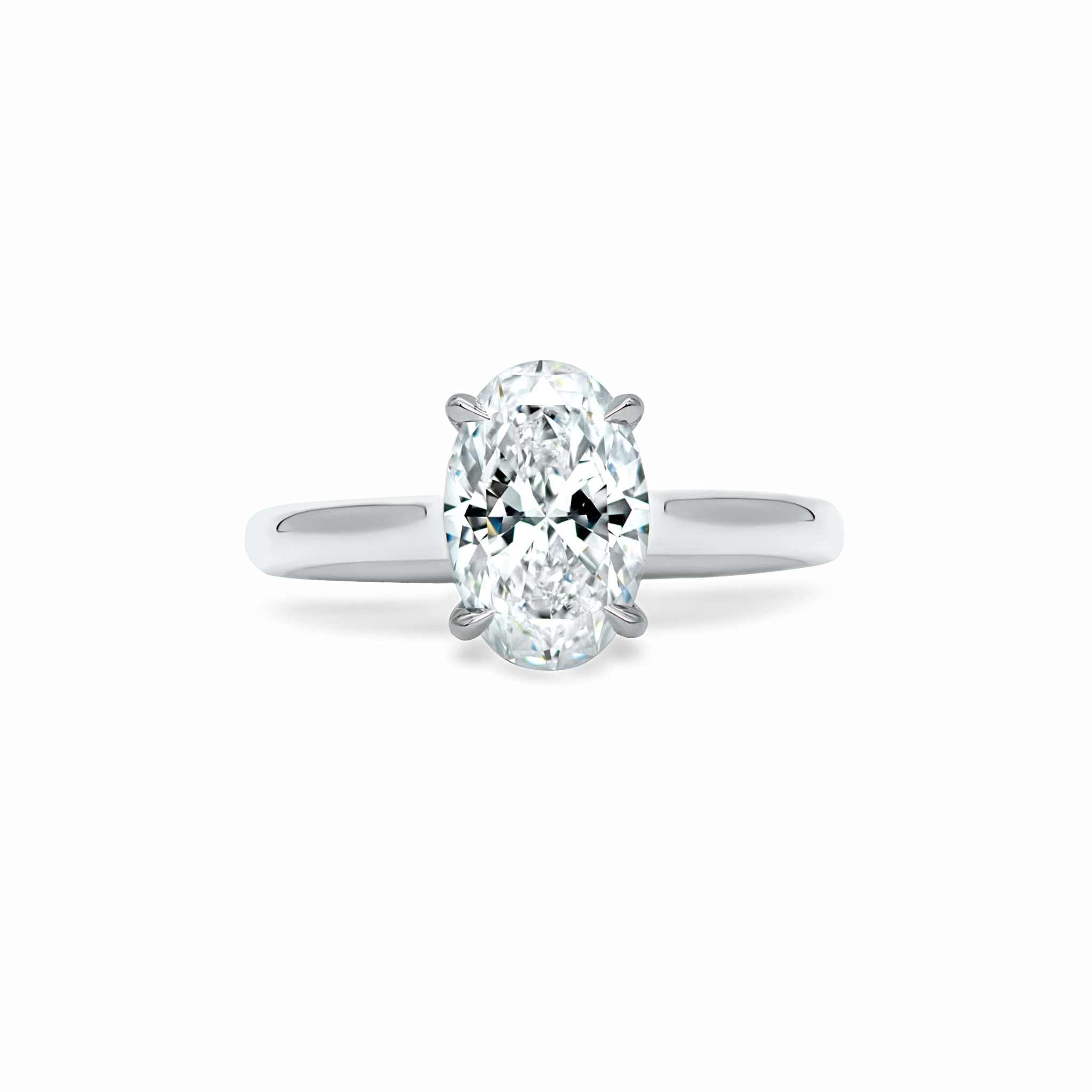 Esmeralda Solitaire Engagement Ring with oval-cut diamond set in platinum band