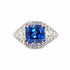 Hailey 3 Stone Halo Sapphire ring with cushion-cut blue sapphire and round diamonds in platinum setting