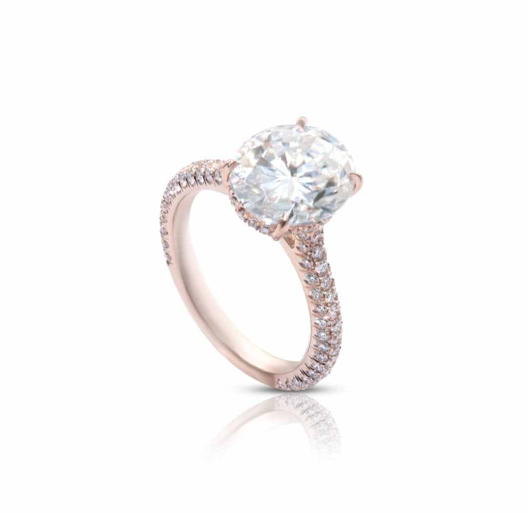 Rose gold Leah three row pave engagement ring with 2ct oval cut lab grown diamond and hidden halo design