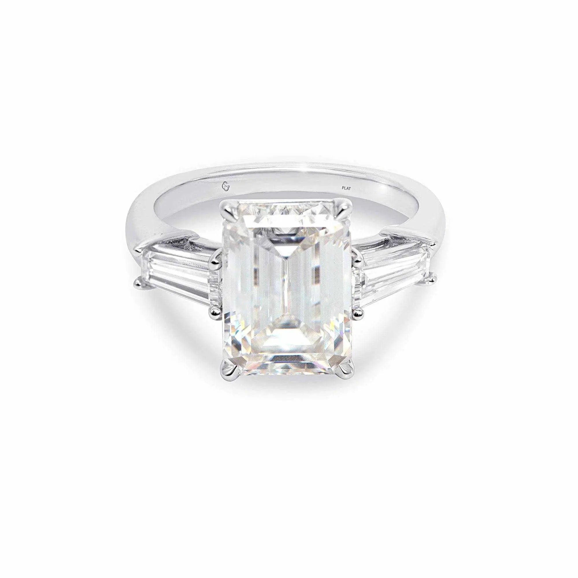 Meira three stone engagement ring with 2-carat emerald-cut diamond and baguette side stones in white gold