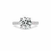 Ora Engagement Ring with a large central VS diamond and smaller surrounding FG VS1 diamonds set in 18K gold or platinum band