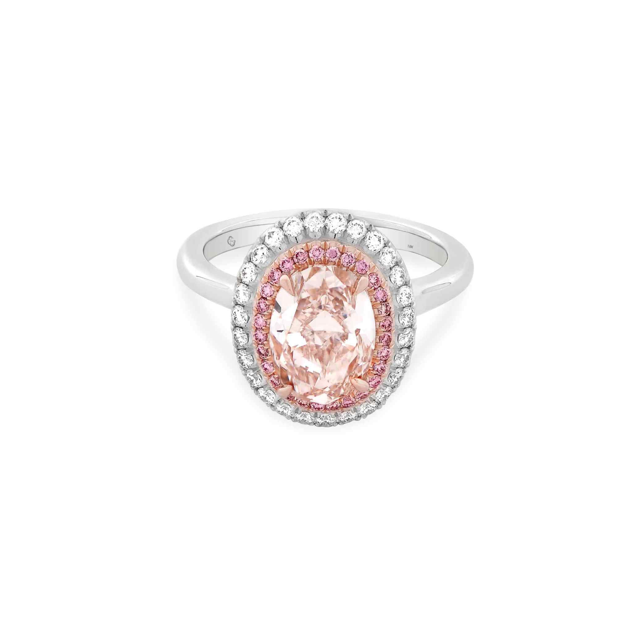 Tiffany Pink Diamond Engagement Ring with oval-cut pink diamond and double halo setting in platinum and 18k gold