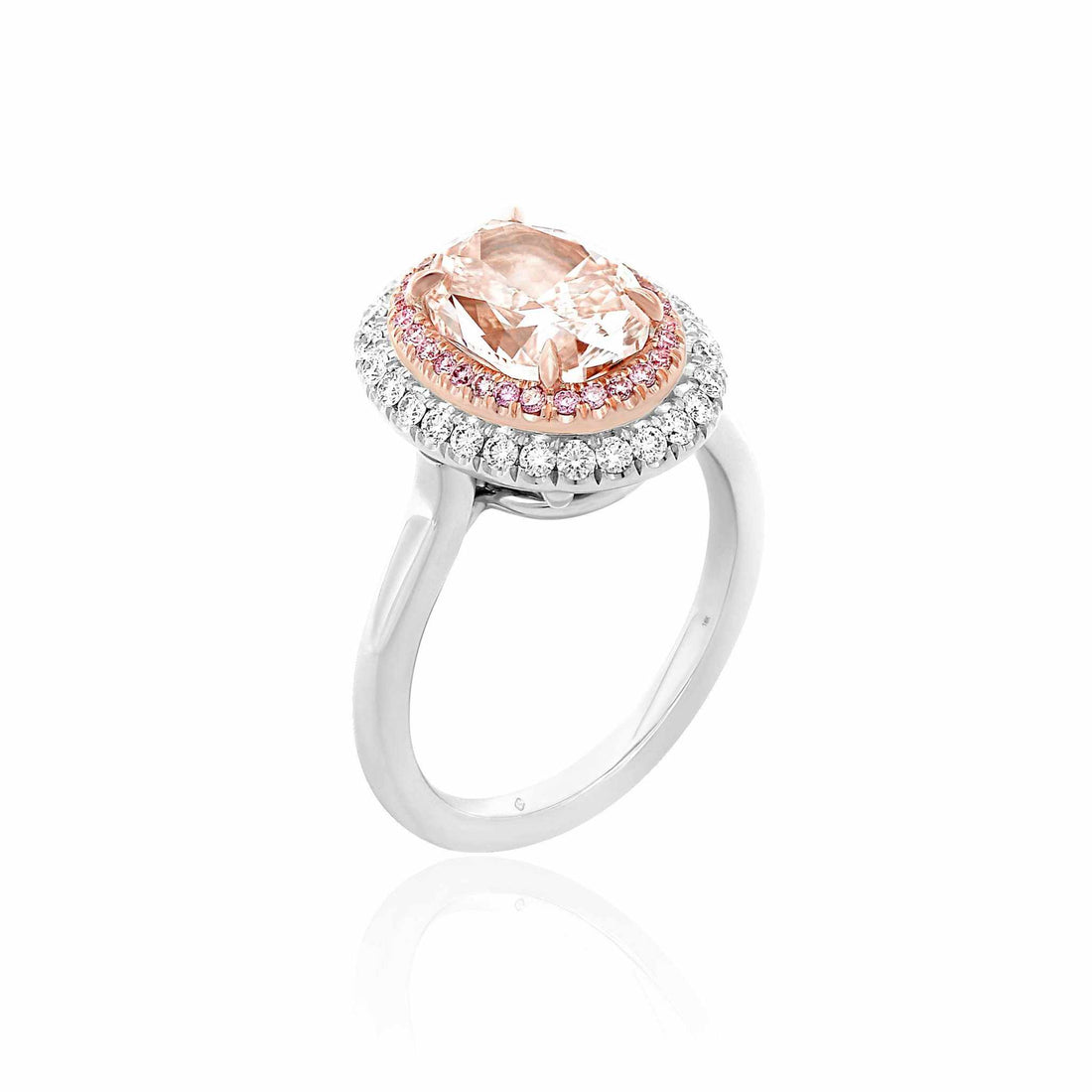 Tiffany Pink Diamond Engagement Ring with oval-cut pink diamond and double halo setting in platinum and 18k gold