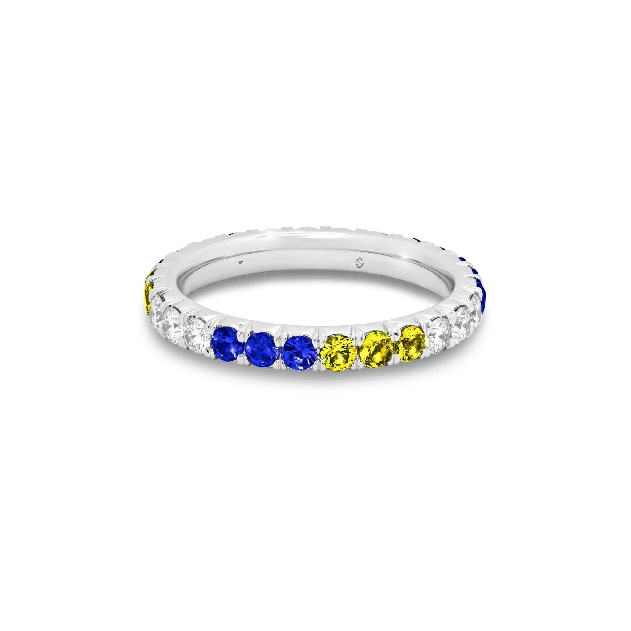 Platinum sapphire eternity band with alternating blue sapphires, yellow gemstones, and diamonds