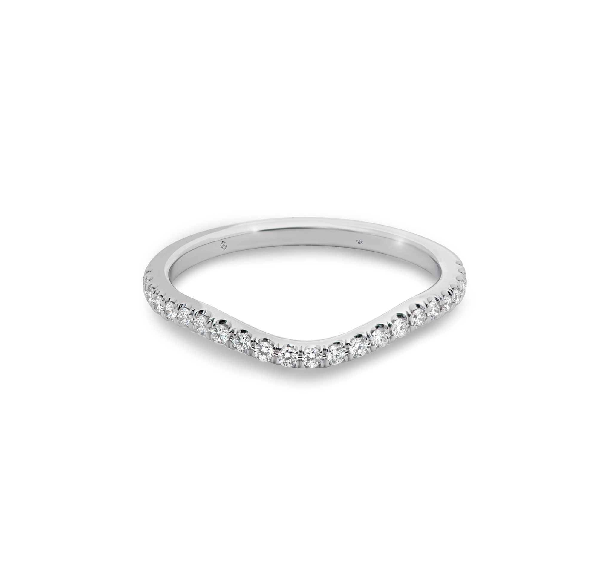 Shanah Diamond wedding band in white gold with round EF VS diamonds and a curved design for pairing with engagement rings