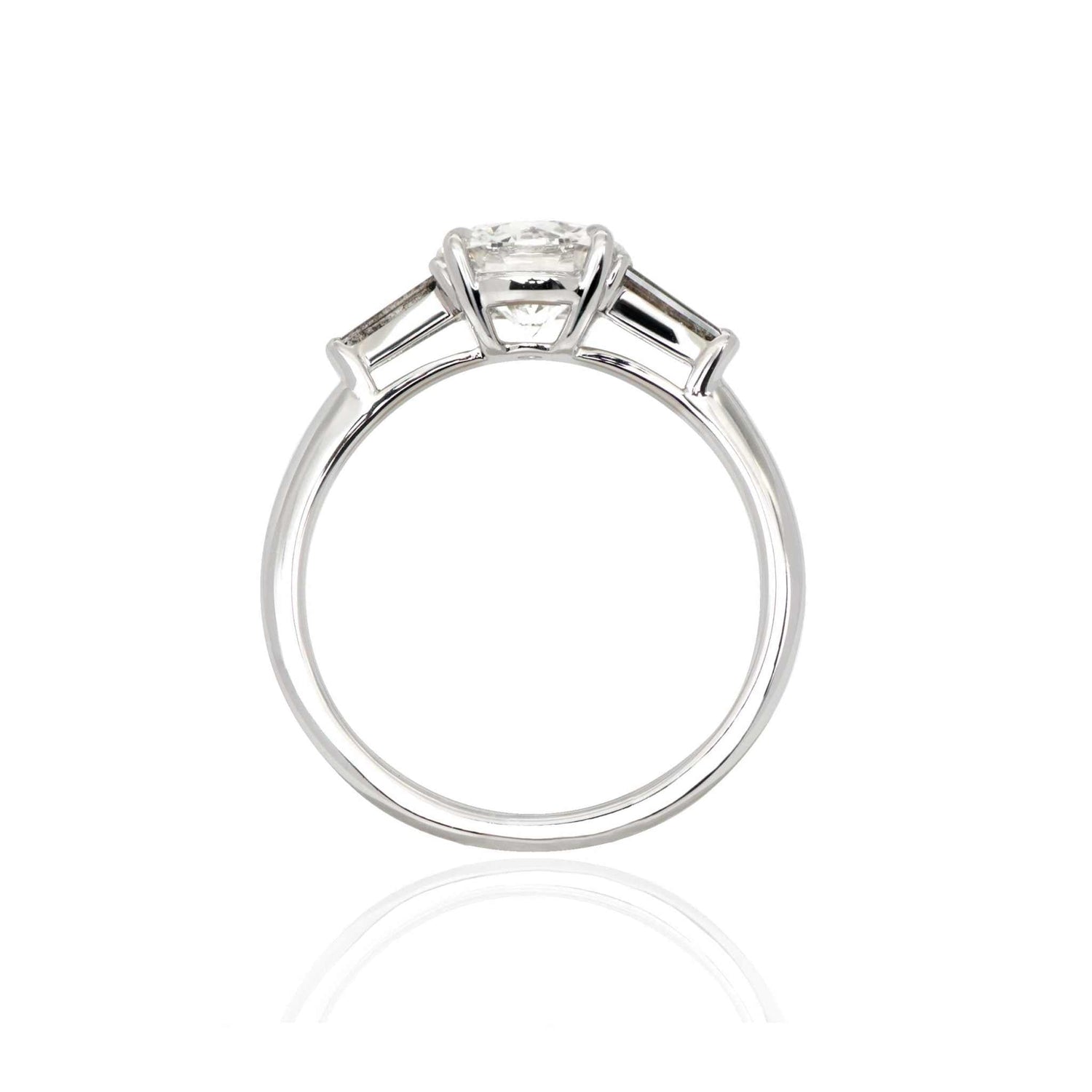 Sierra three stone engagement ring with 1.6-carat salt-and-pepper diamond and gray baguette side stones on silver band