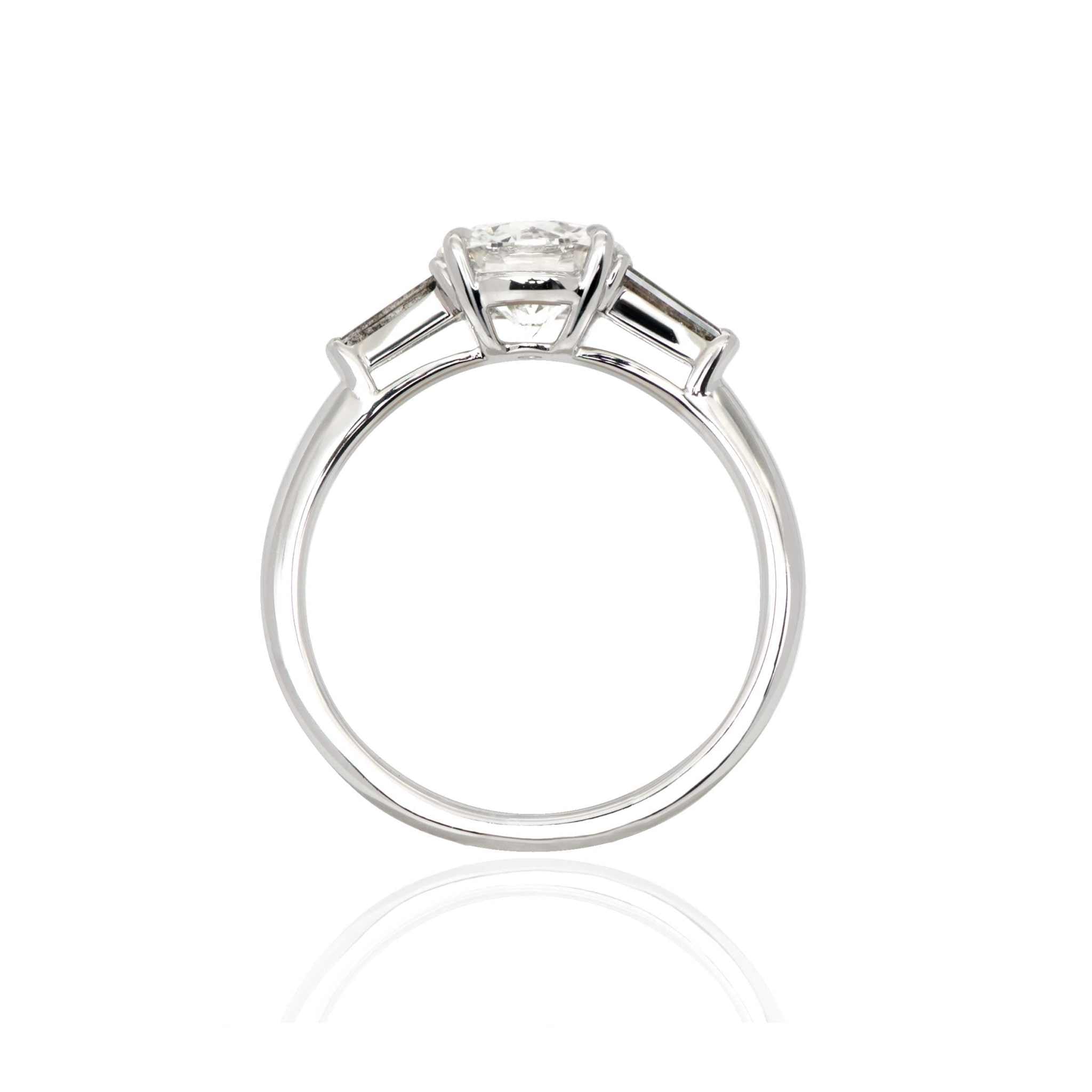 Sierra three stone engagement ring with 1.6-carat salt-and-pepper diamond and gray baguette side stones on silver band